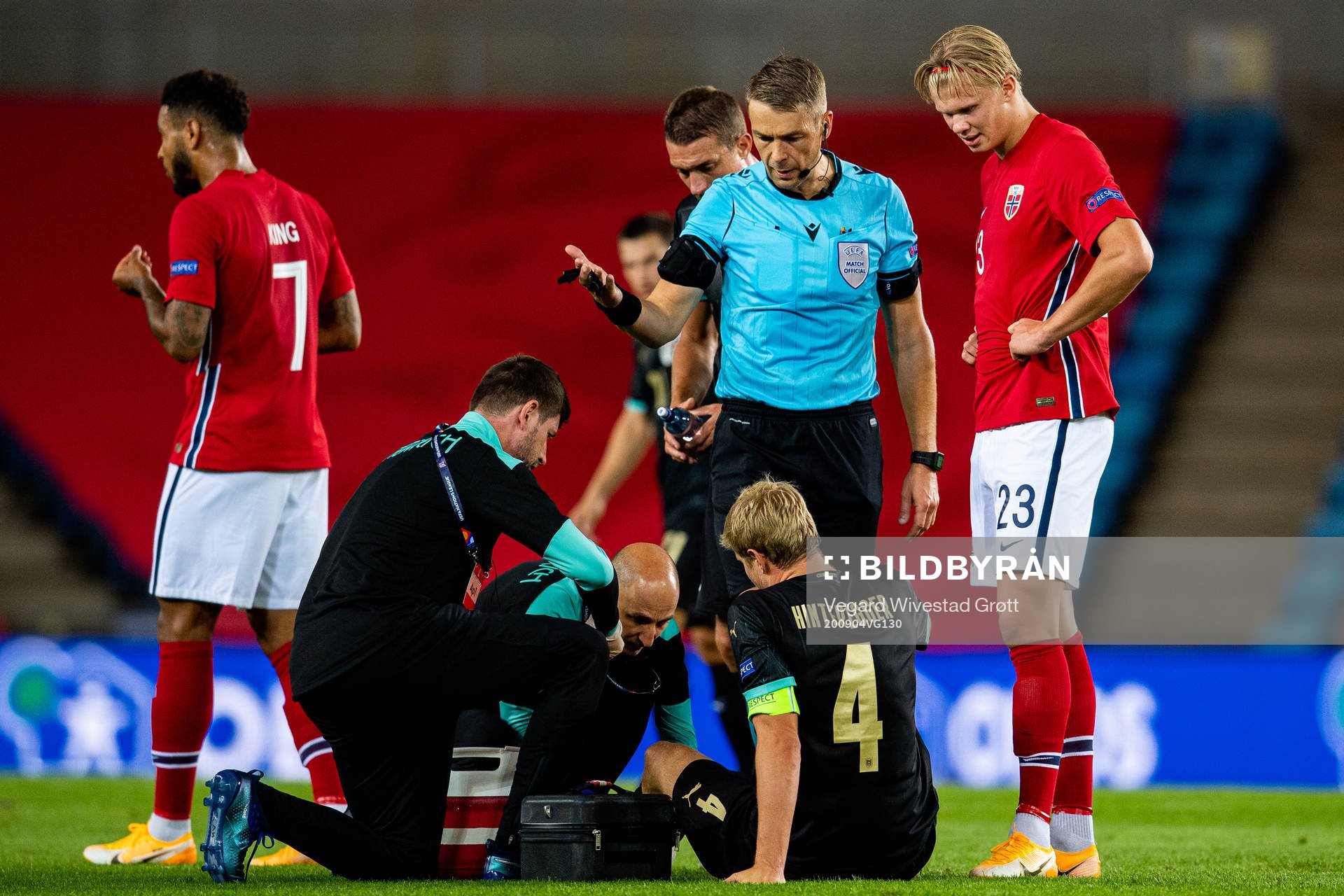 Martin Hinteregger of Austria, referee Mattias Gestranius