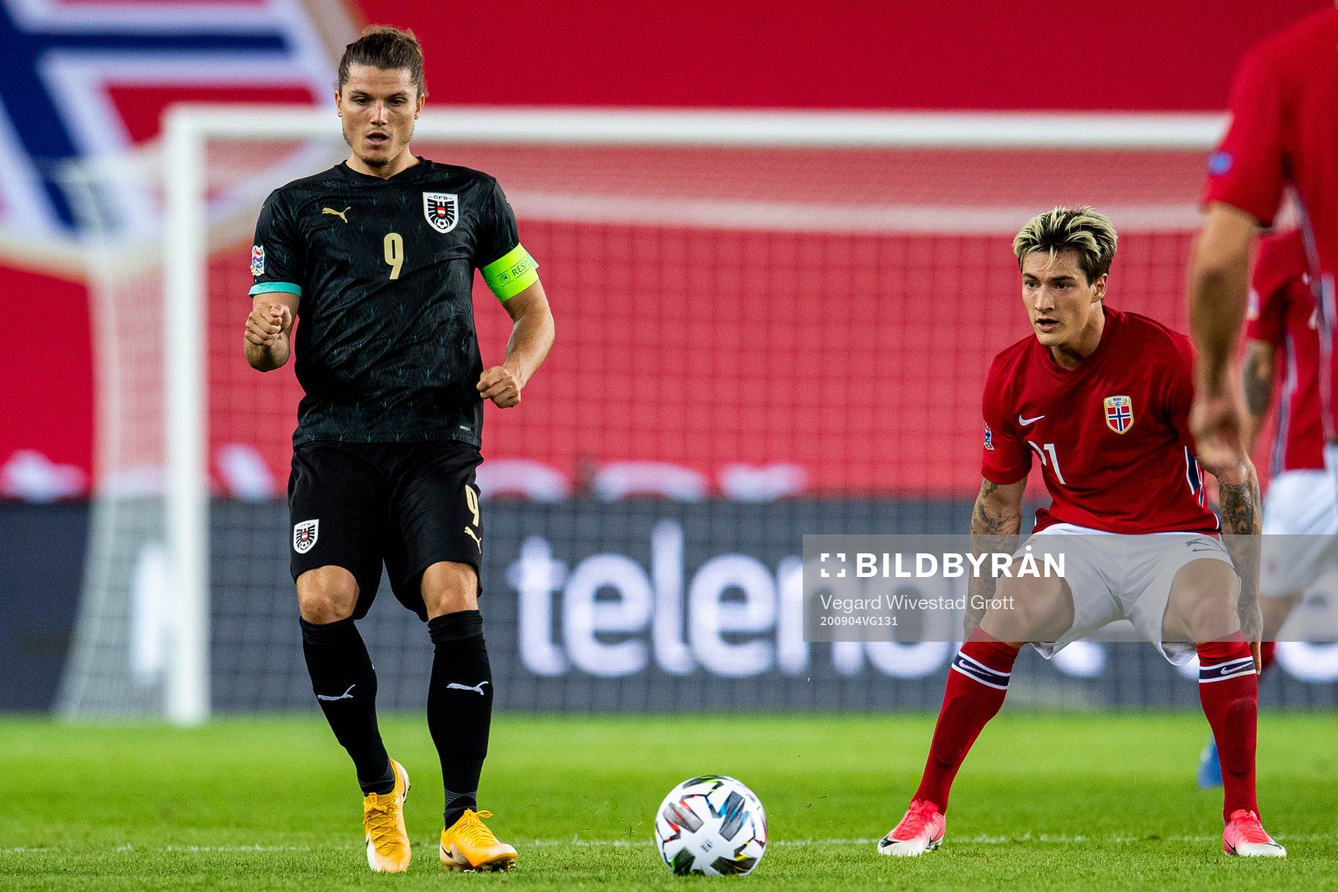 Marcel Sabitzer of Austria and Mathias Normann of Norway