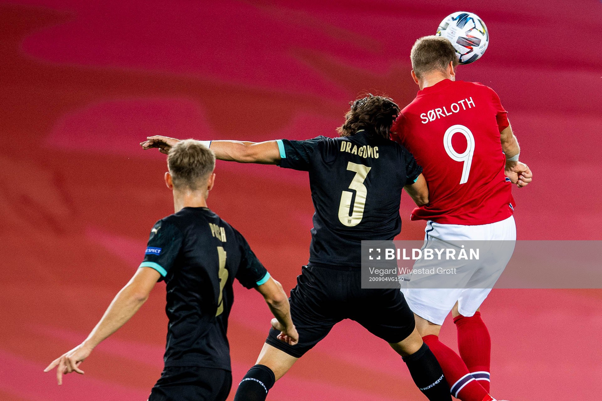 Aleksandar Dragovic of Austria and Alexander Sørloth of
