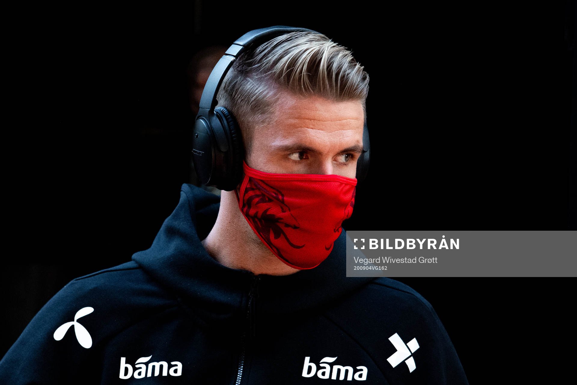 Kristoffer Ajer of Norway arrives wearing a face mask