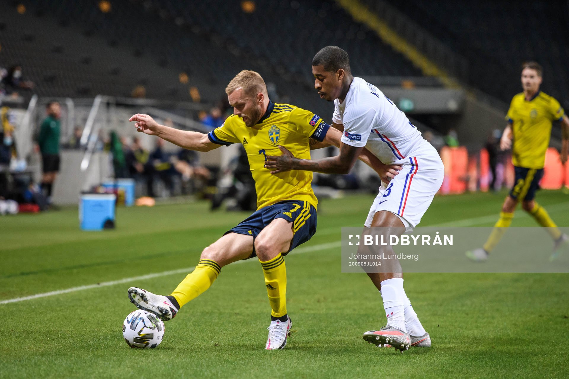 Sebastian Larsson of Sweden and Presnel Kimpembe of France