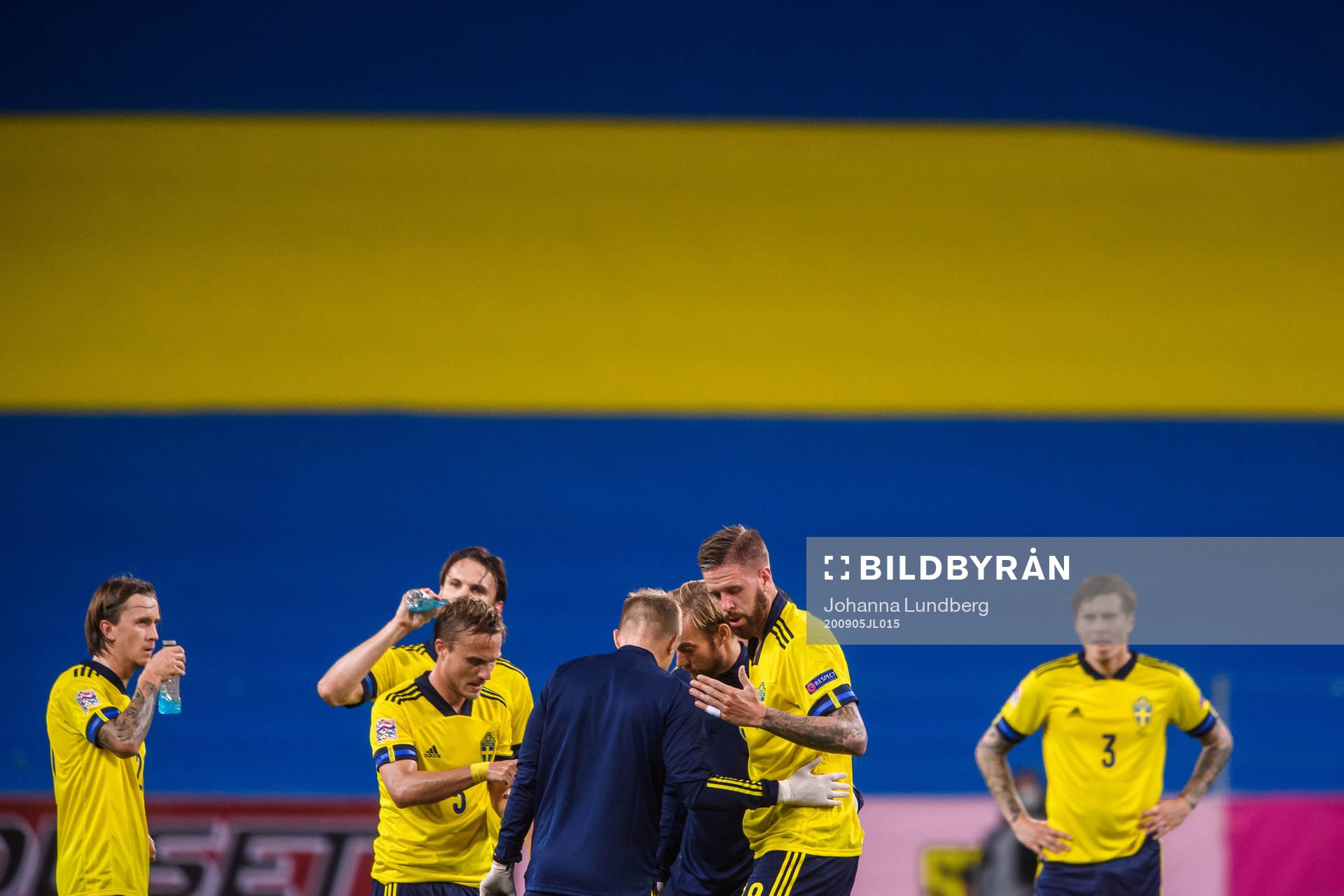 Pontus Jansson of Sweden receives medical attention