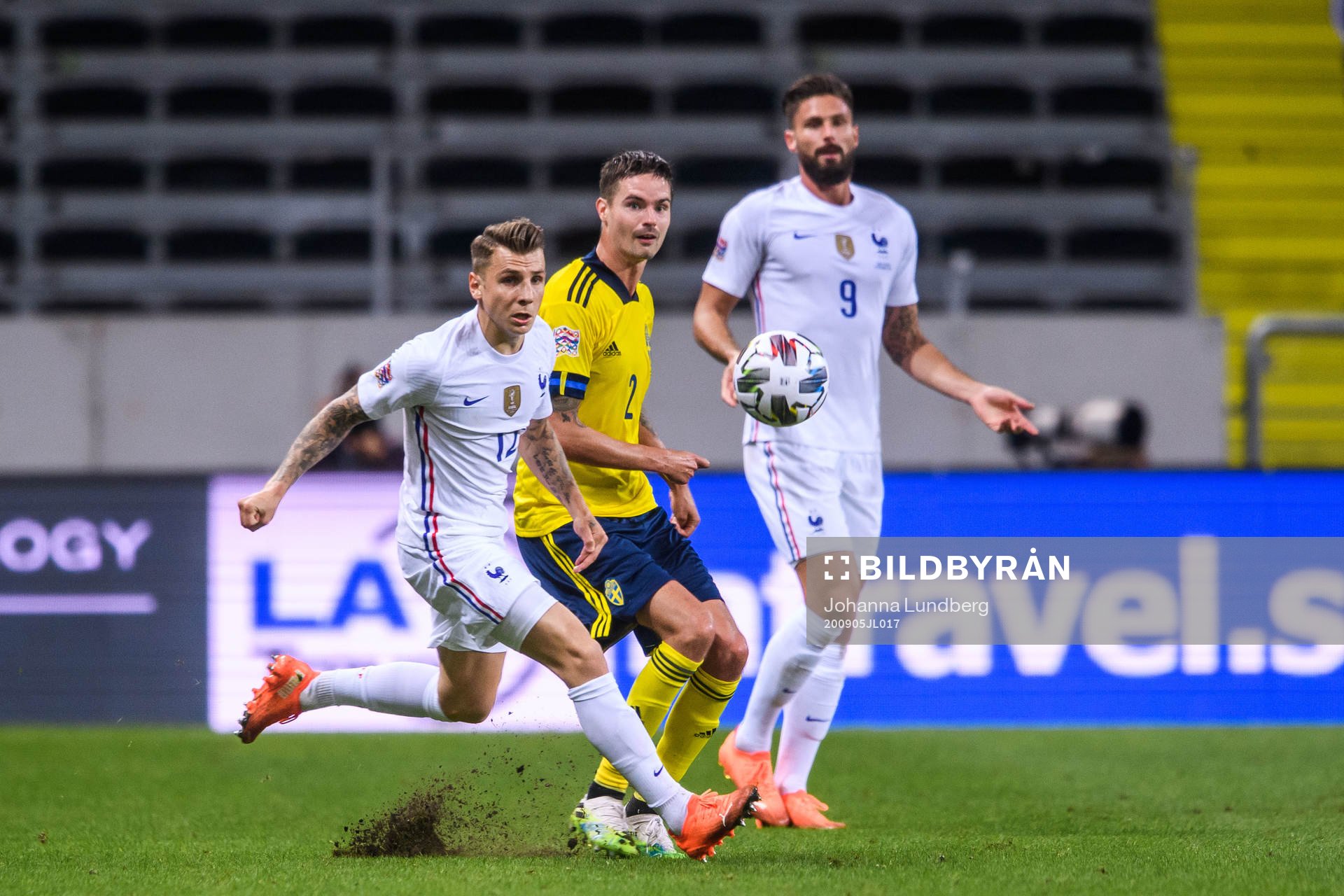 Lucas Digne and Olivier Giroud of France against Mikael