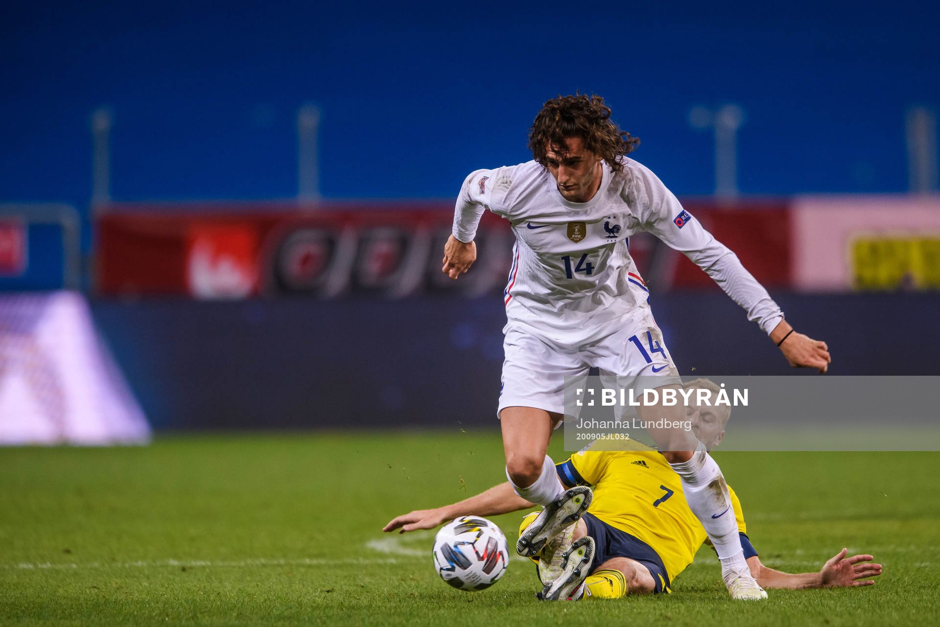 Adrien Rabiot of France and Sebastian Larsson of Sweden