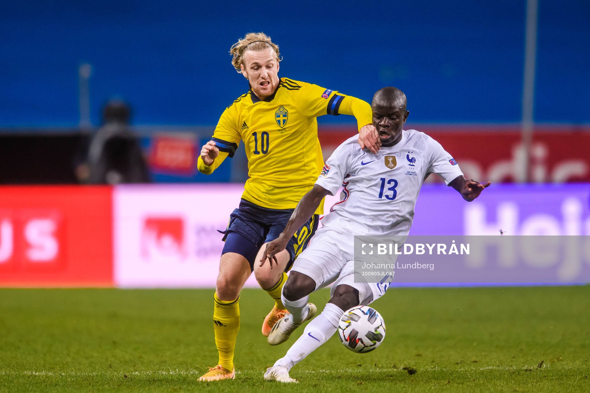 Emil Forsberg of Sweden and N'Golo Kanté of France