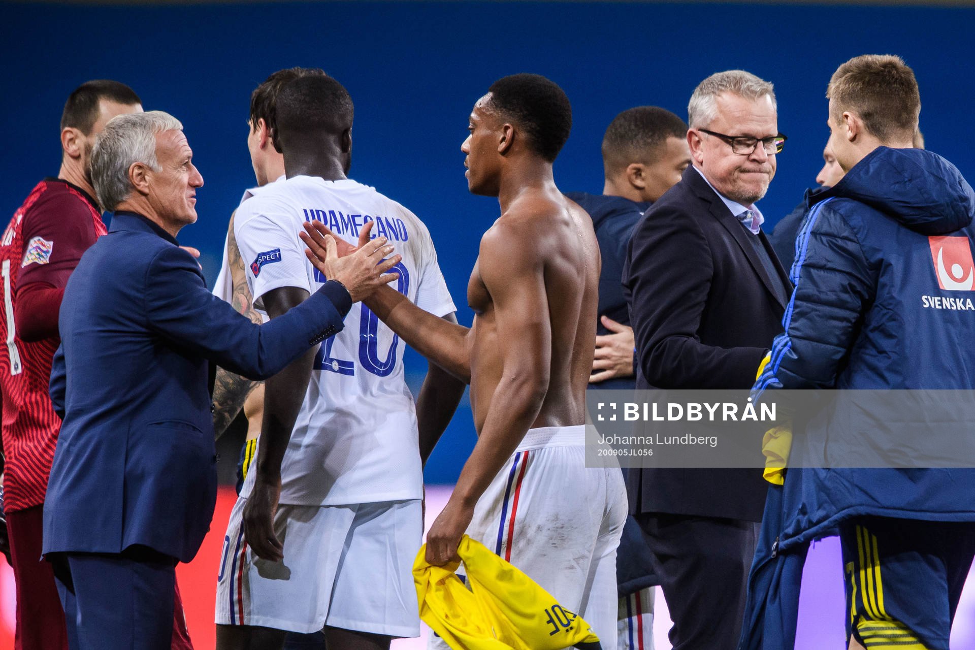 Head coach Didier Deschamps of France and head coach Janne