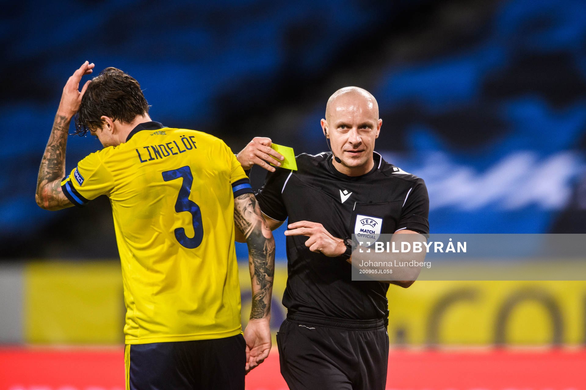 Victor Nilsson Lindelöf of Sweden receives a warning from