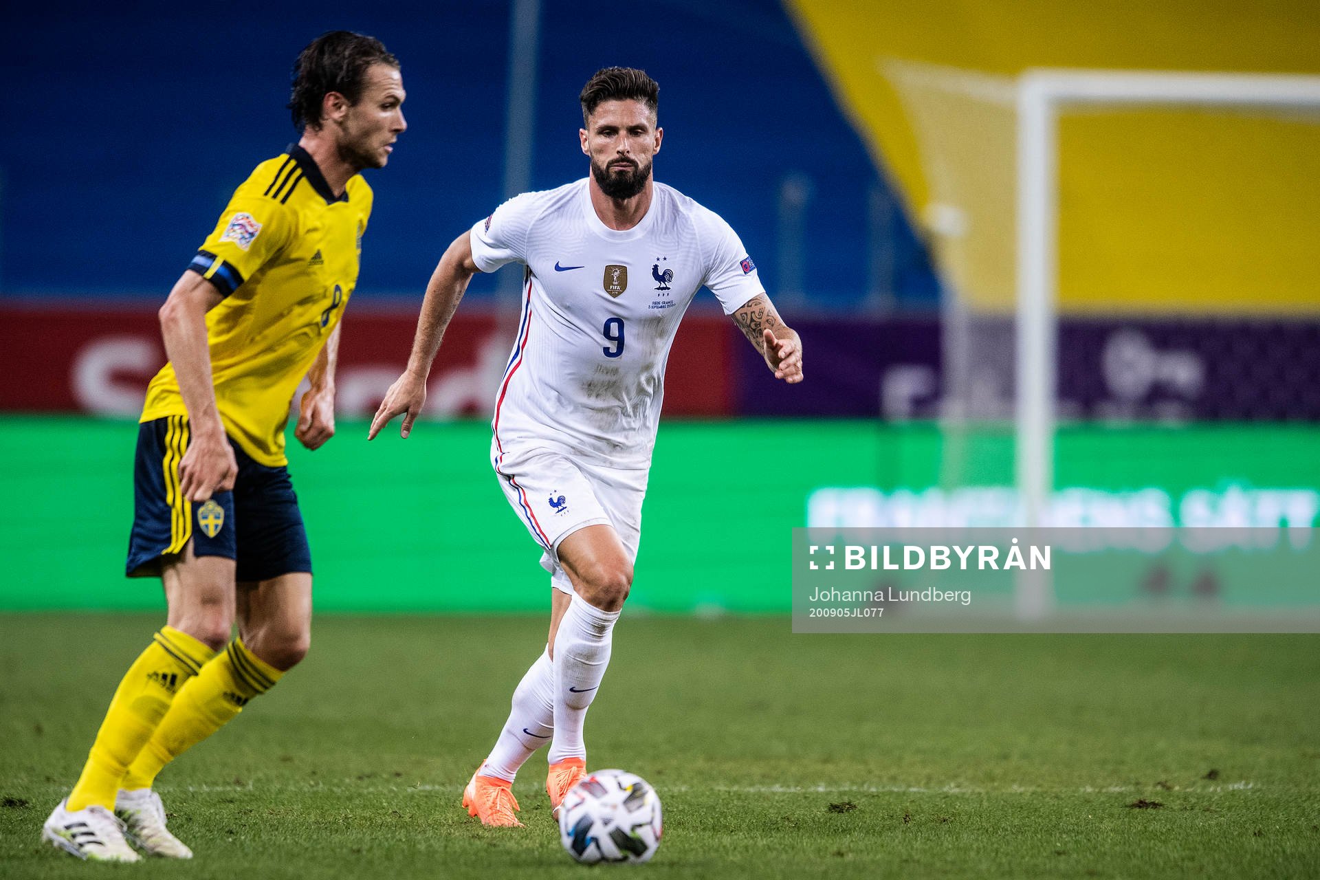 Albin Ekdal of Sweden and Olivier Giroud of France