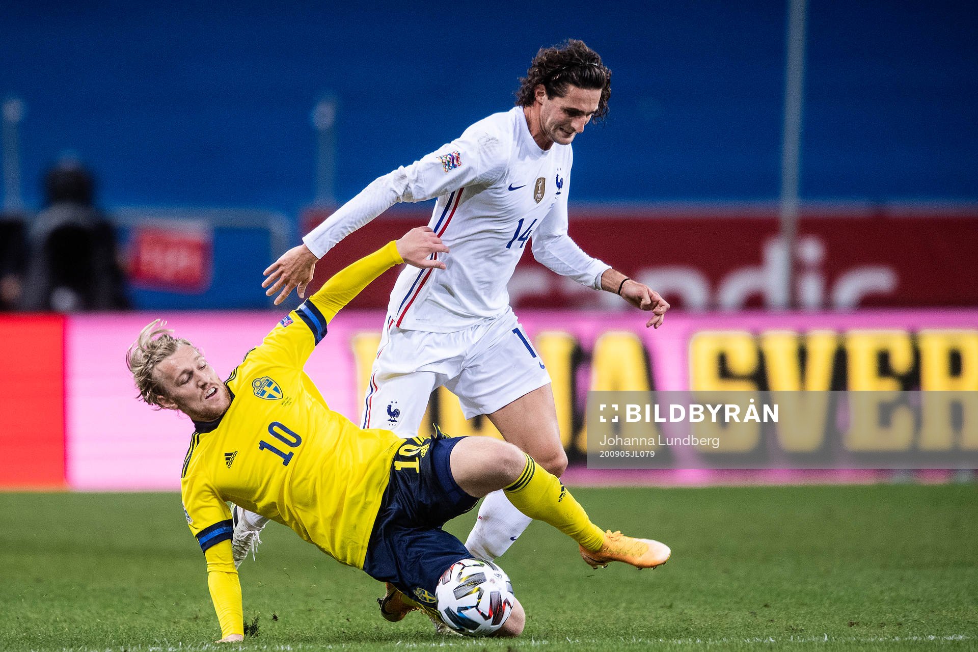 Emil Forsberg of Sweden and Adrien Rabiot of France