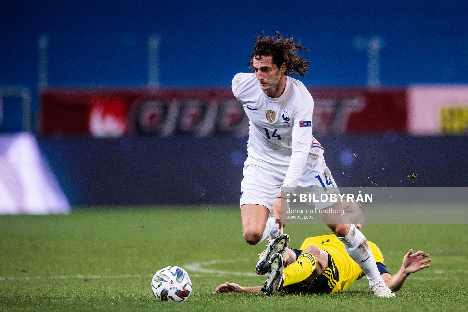Adrien Rabiot of France and Sebastian Larsson of Sweden