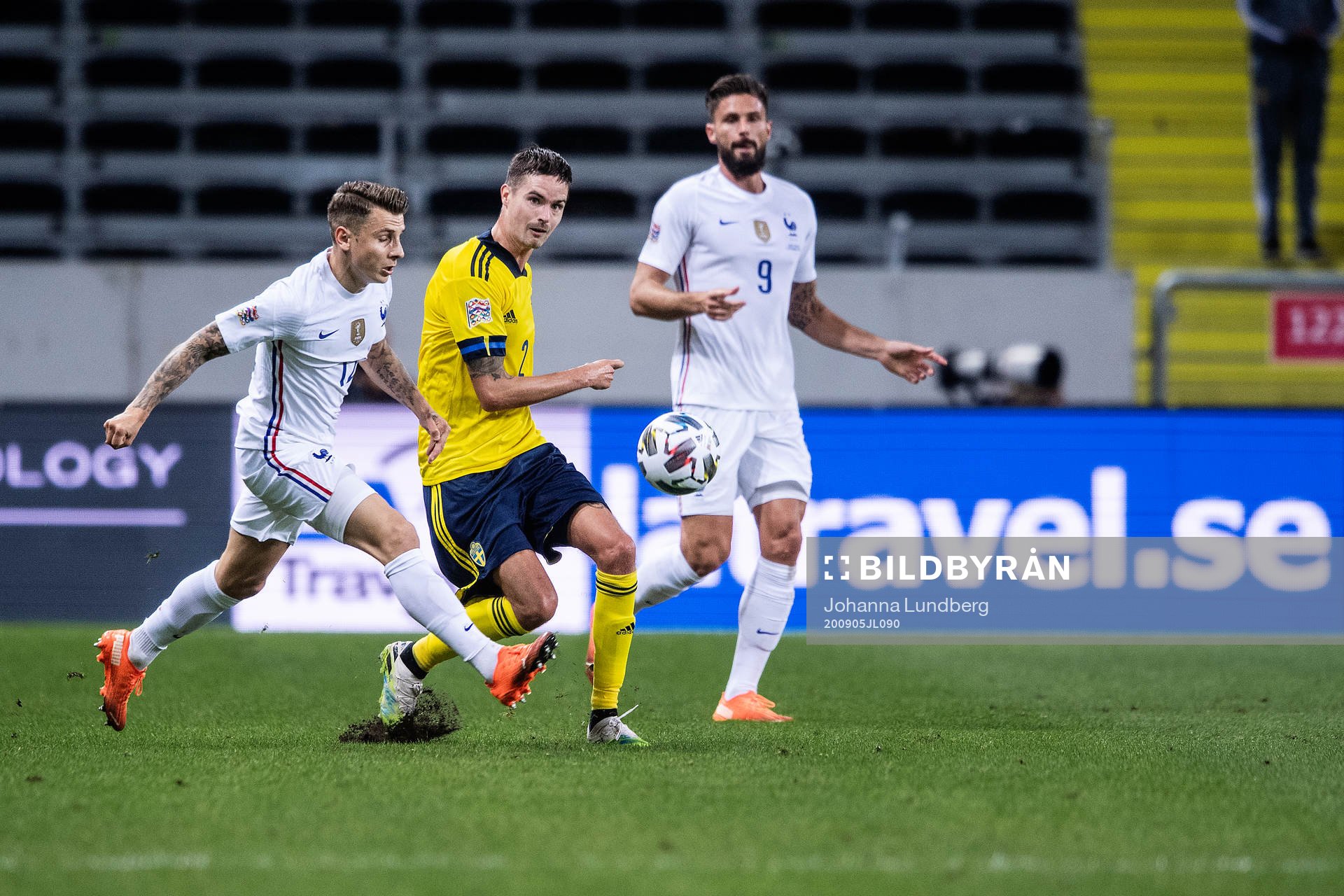 Adrien Rabiot and Olivier Giroud of France against Mikael