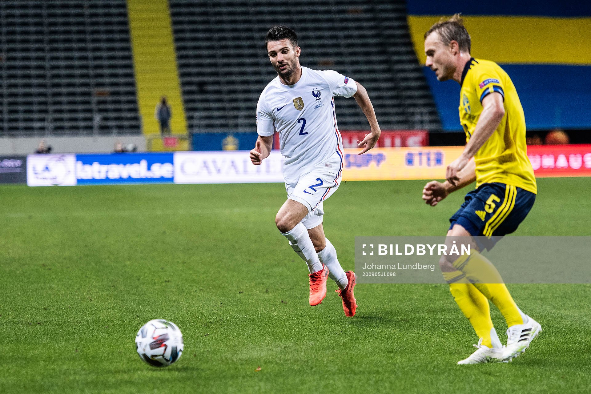 Léo Dubois of France and Pierre Bengtsson of Sweden