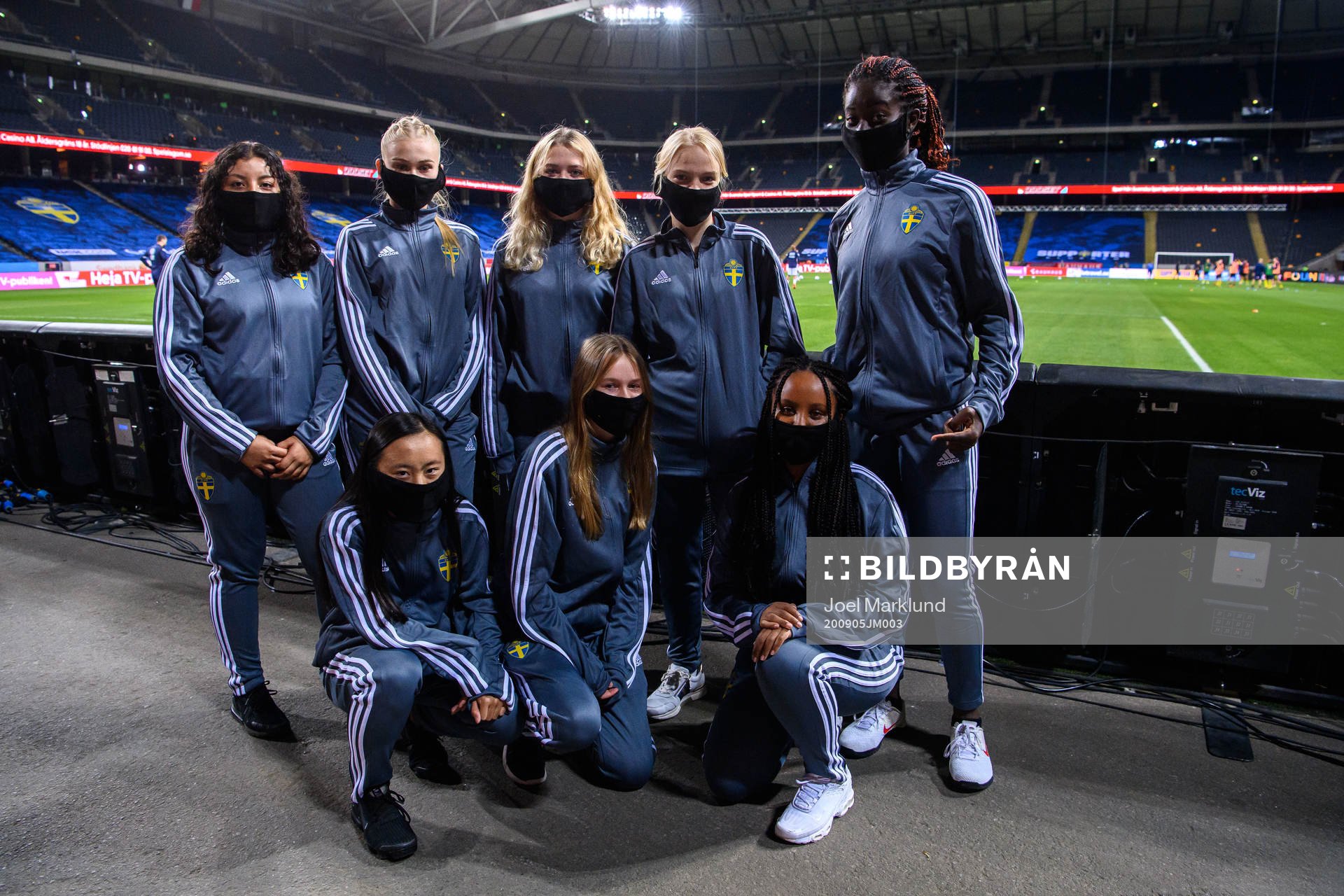 Ball girls pose for a group photo