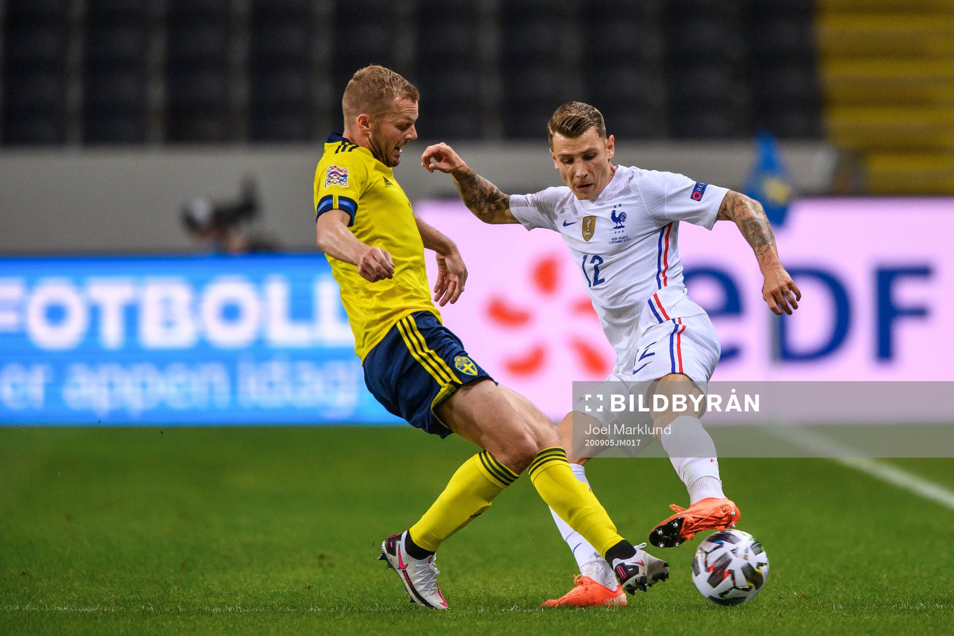 Sebastian Larsson of Sweden and Lucas Digne of France