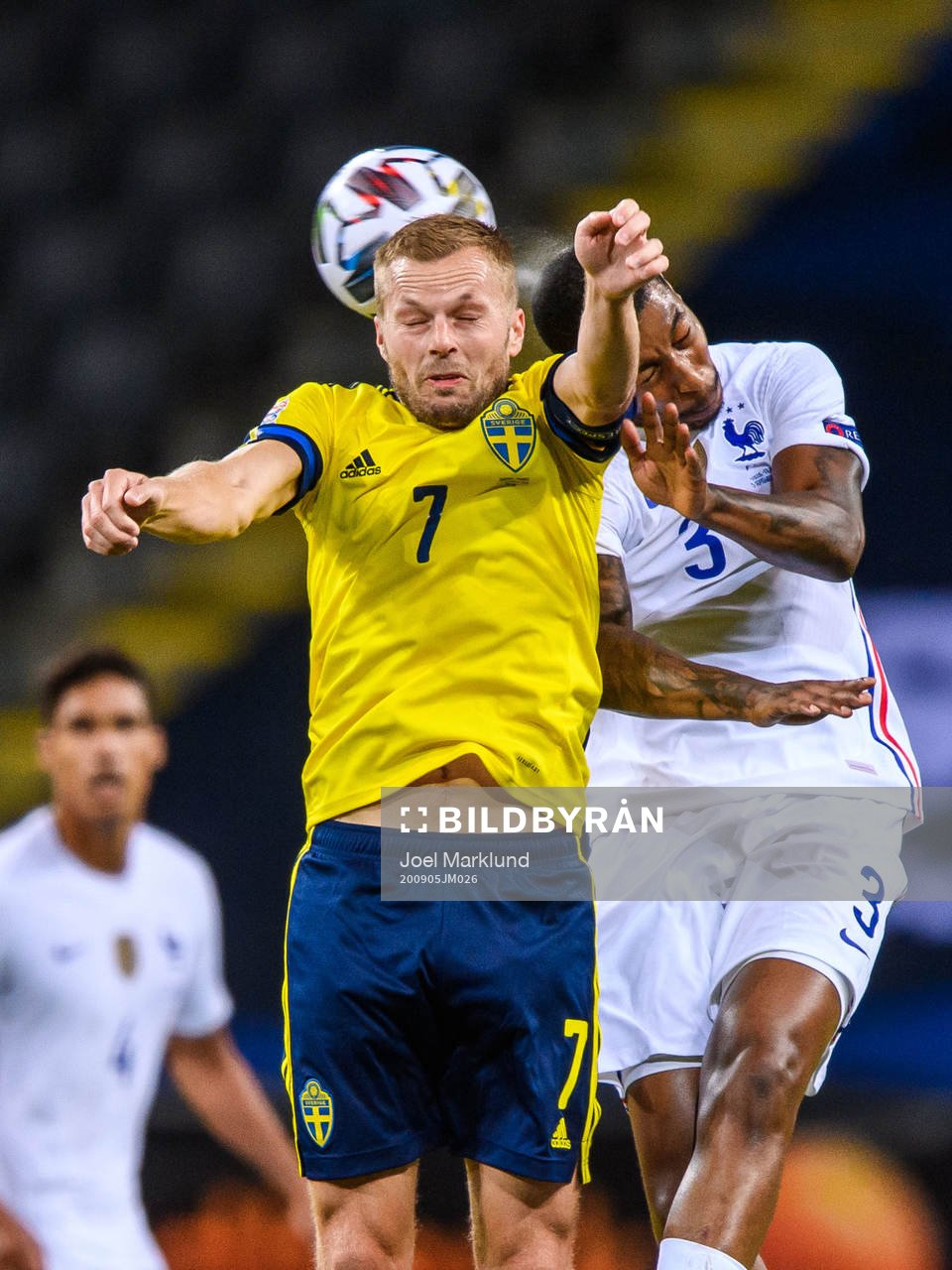 Sebastian Larsson of Sweden and Presnel Kimpembe of France