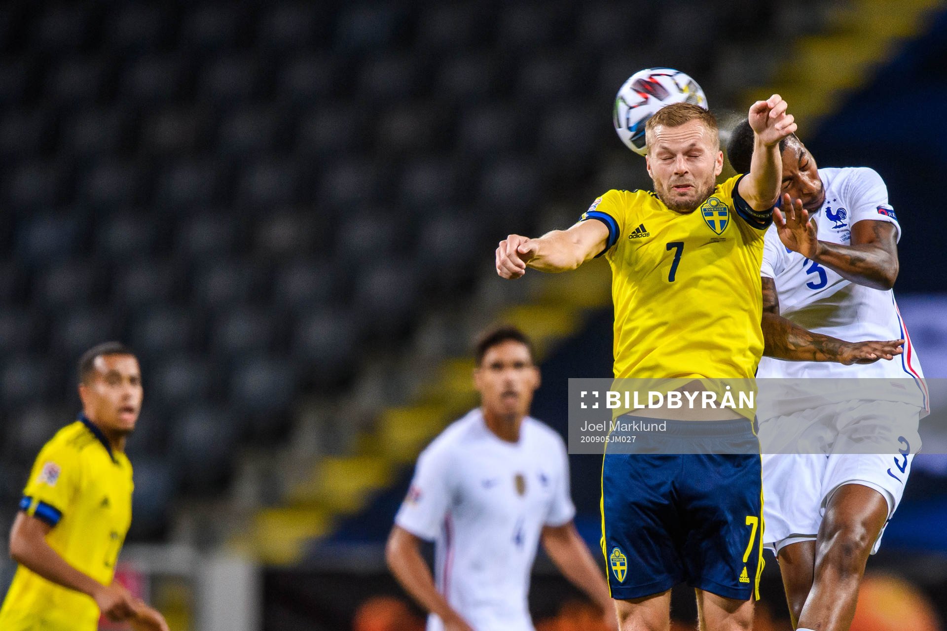 Sebastian Larsson of Sweden and Presnel Kimpembe of France