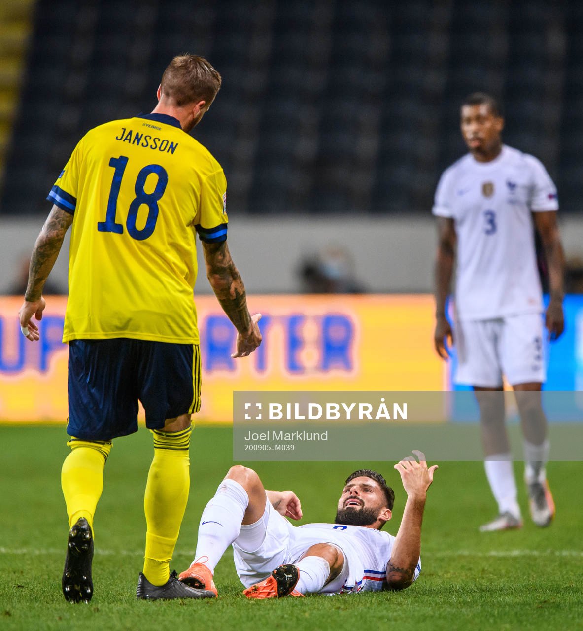 Pontus Jansson of Sweden and Olivier Giroud of France