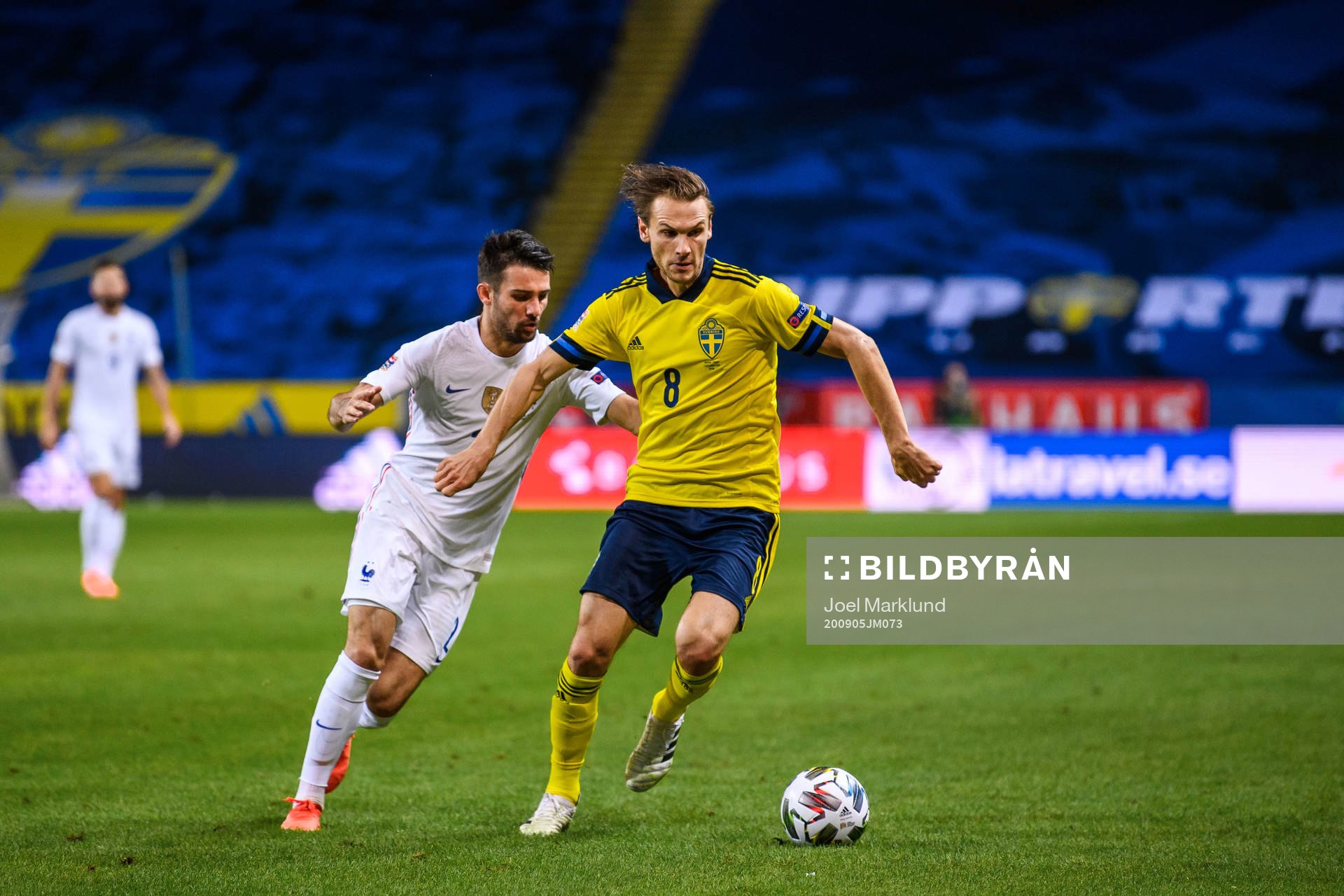 Léo Dubois of France and Albin Ekdal of Sweden