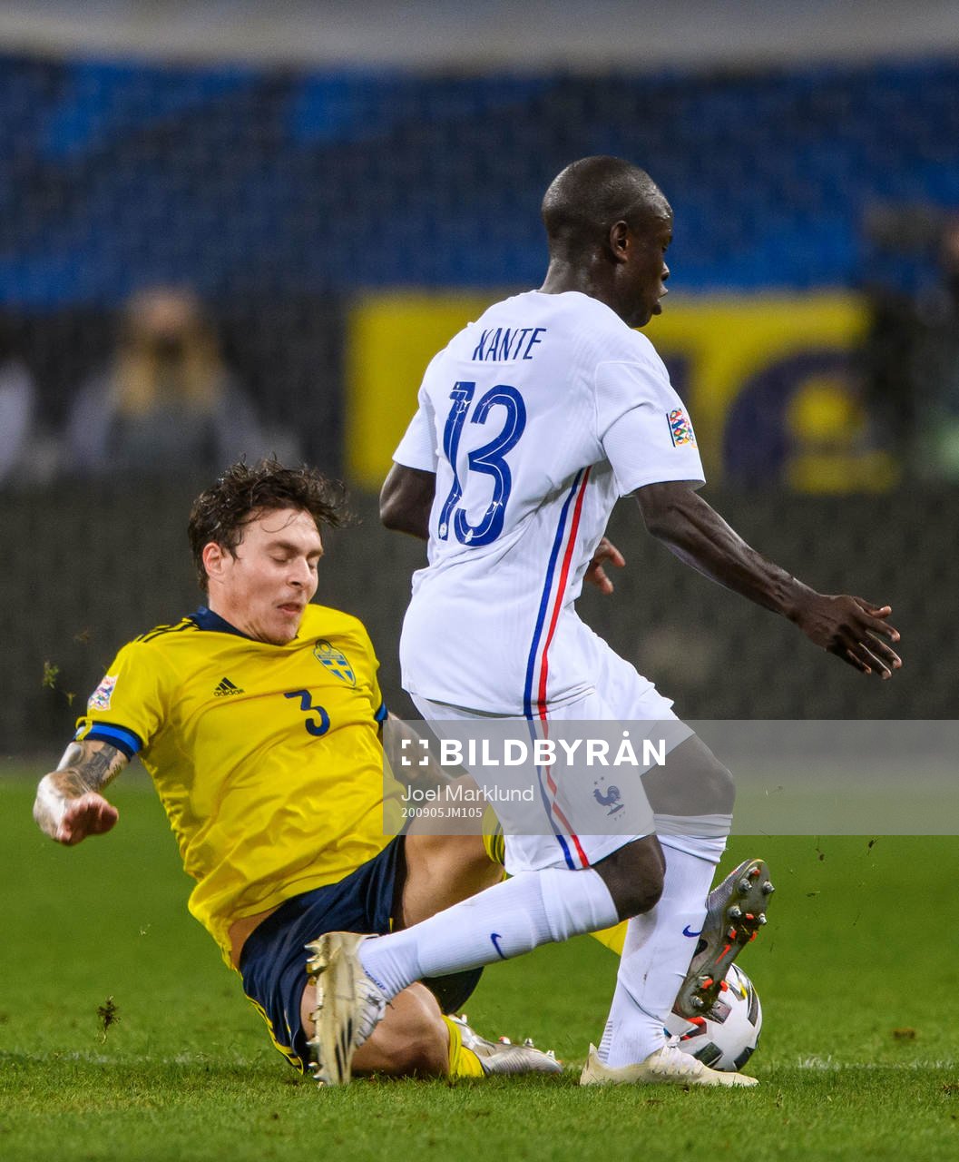 Victor Nilsson Lindelöf of Sweden and N'Golo Kanté of