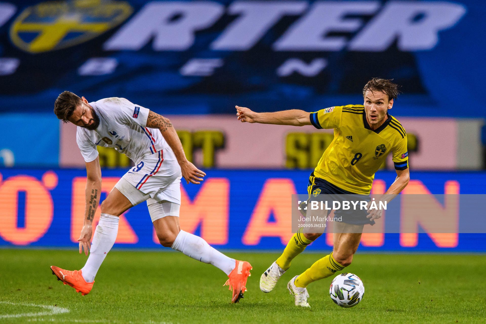 Olivier Giroud of France and Albin Ekdal of Sweden
