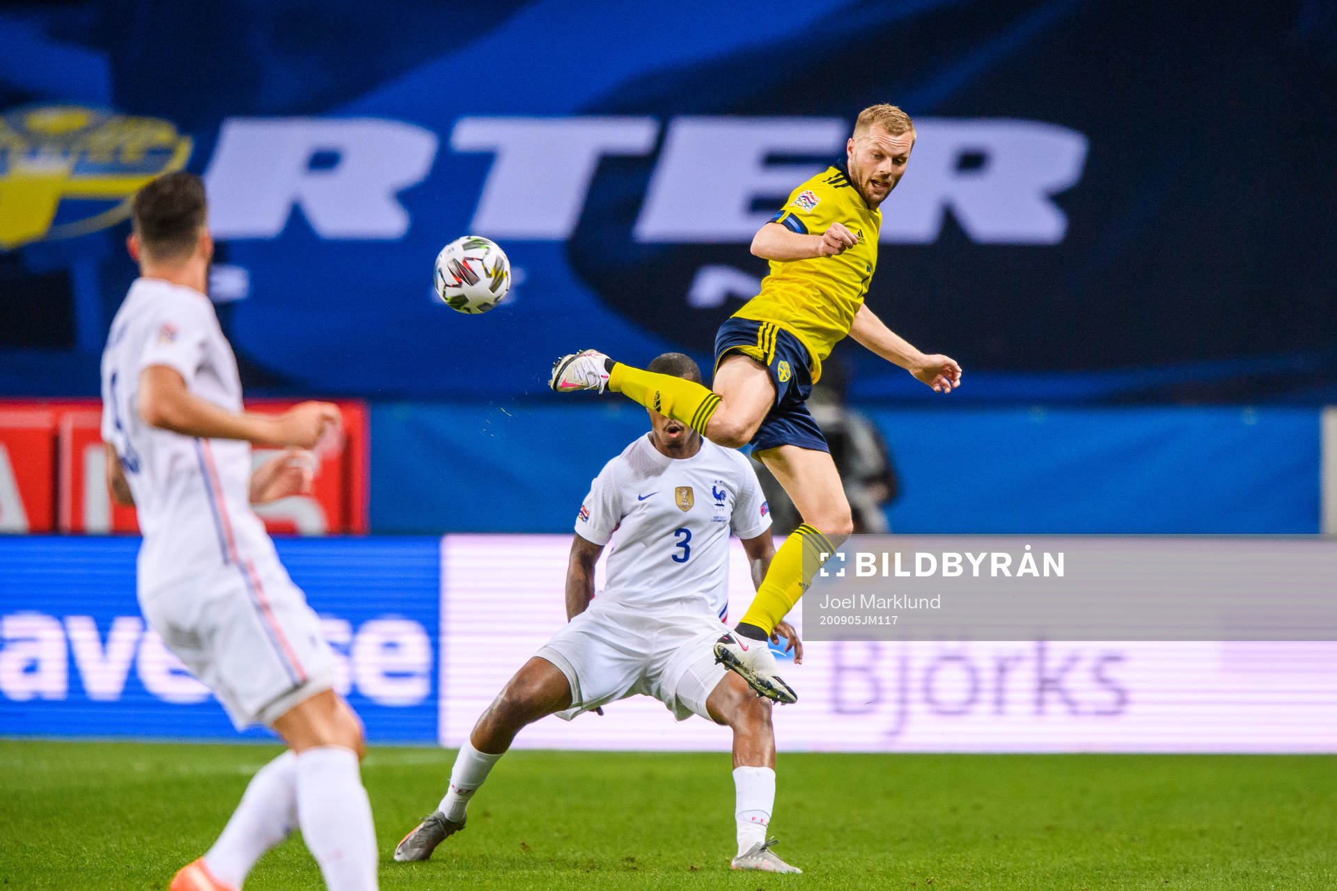 Presnel Kimpembe of France and Sebastian Larsson of Sweden
