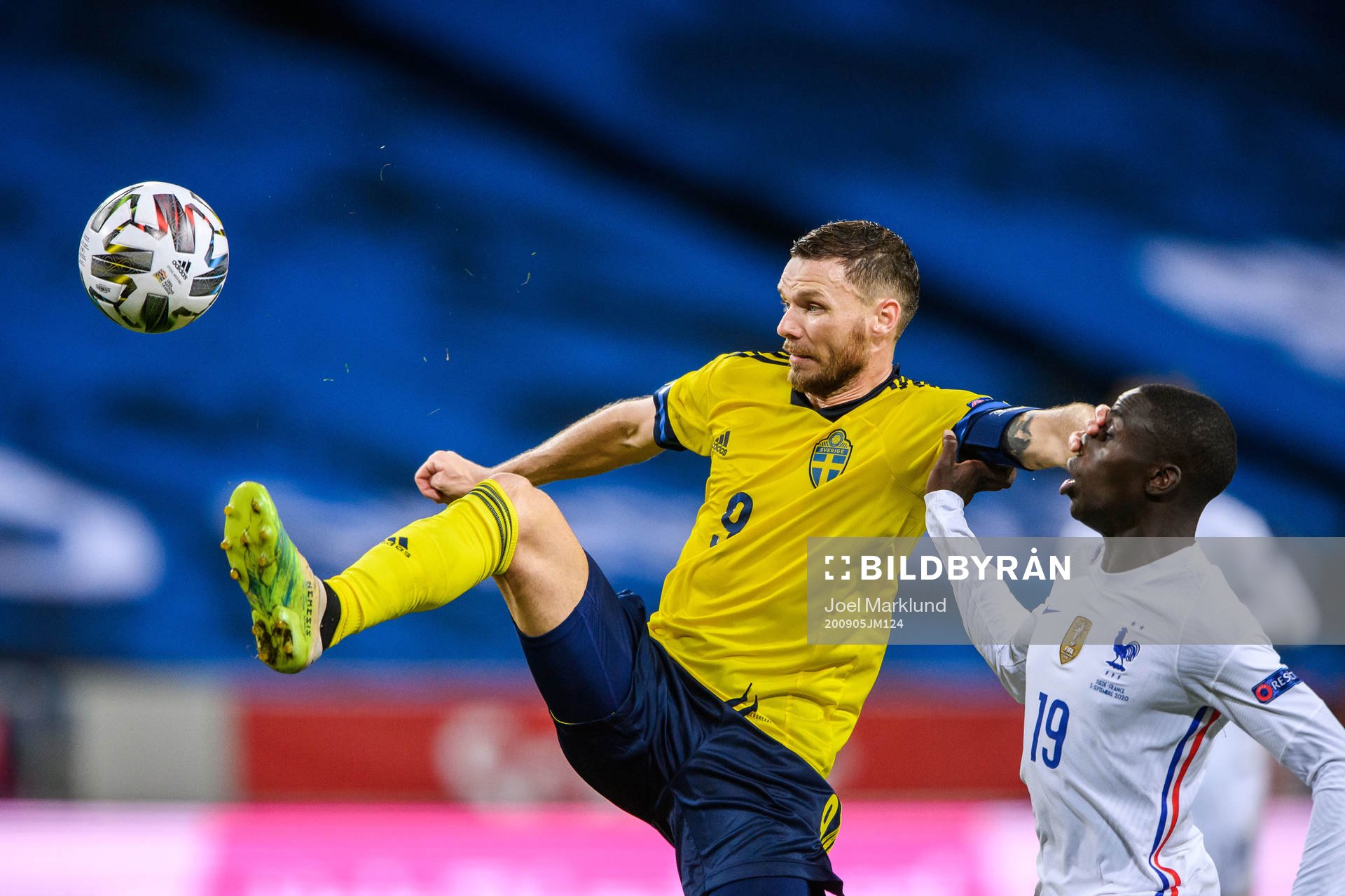 Marcus Berg of Sweden and Ferland Mendy of France