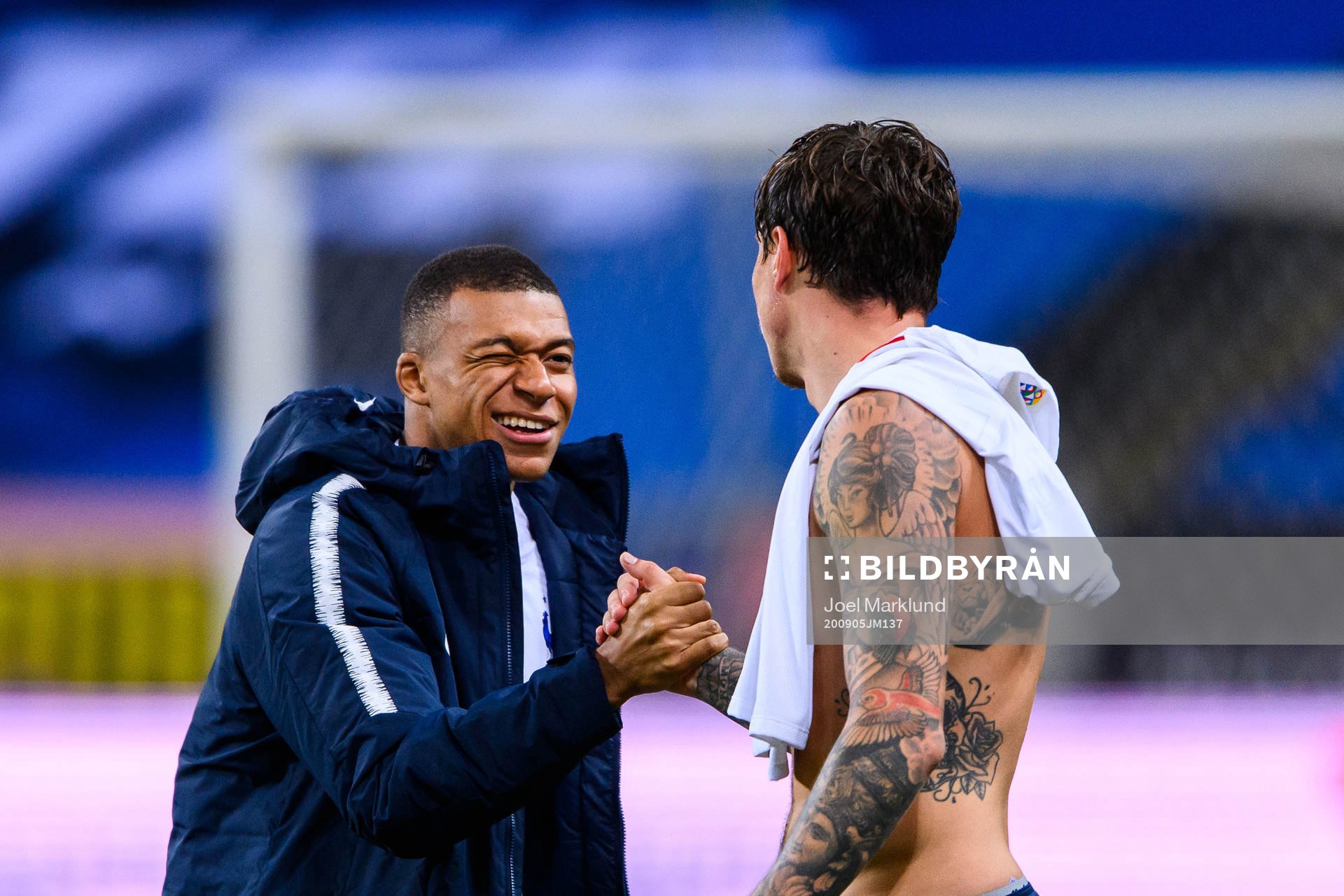 Kylian Mbappé of France and Victor Nilsson Lindelöf of