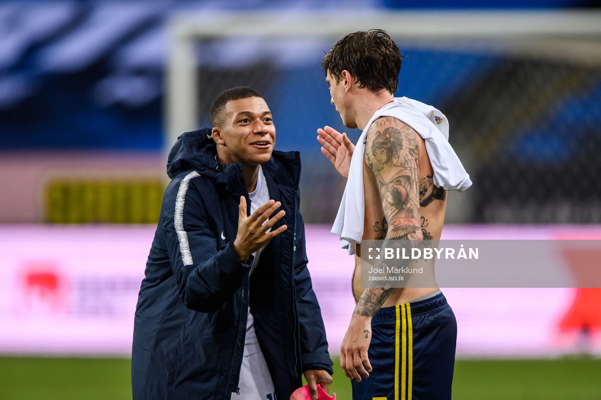 Kylian Mbappé of France and Victor Nilsson Lindelöf of