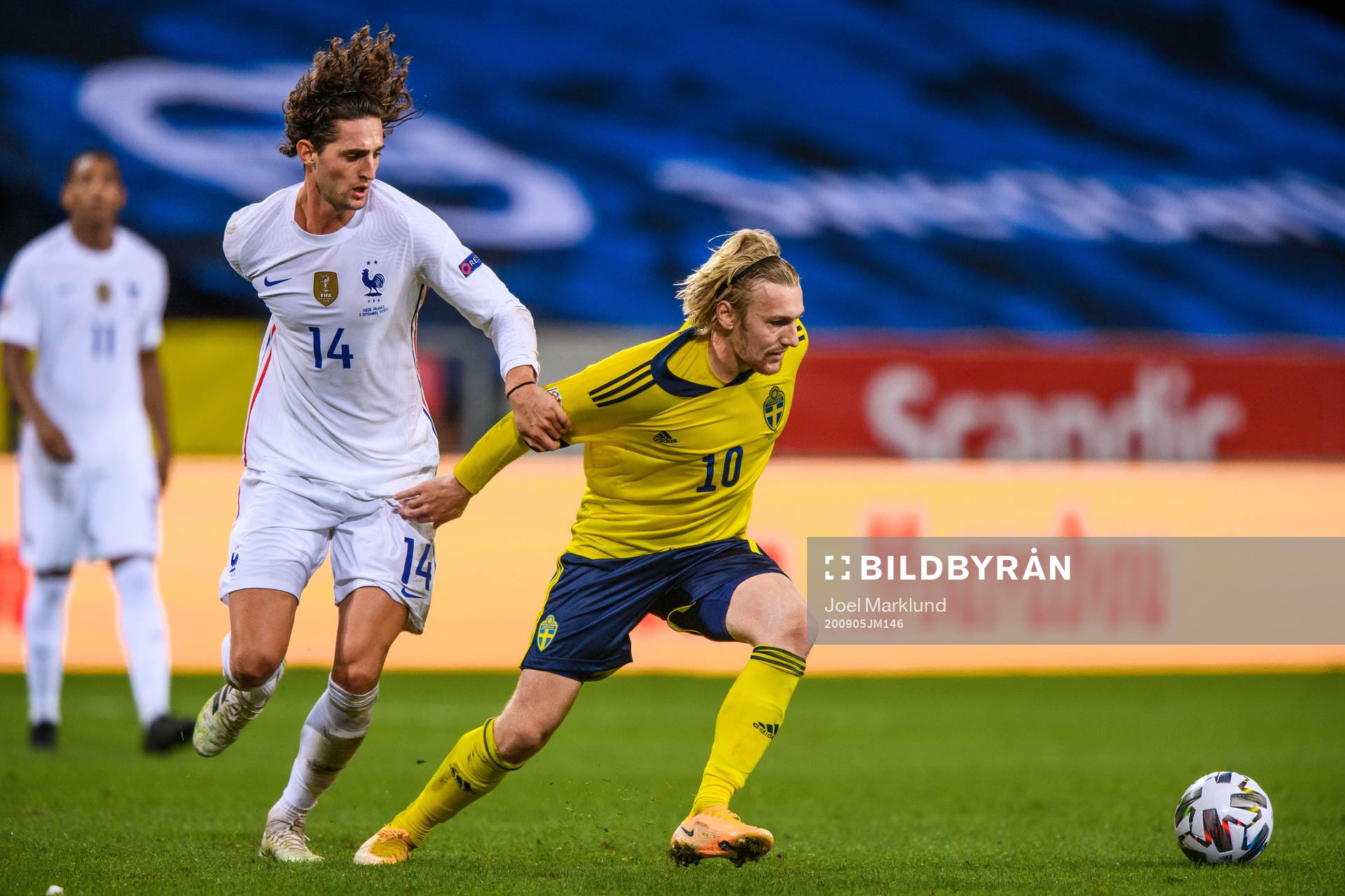 Adrien Rabiot of France and Emil Forsberg of Sweden