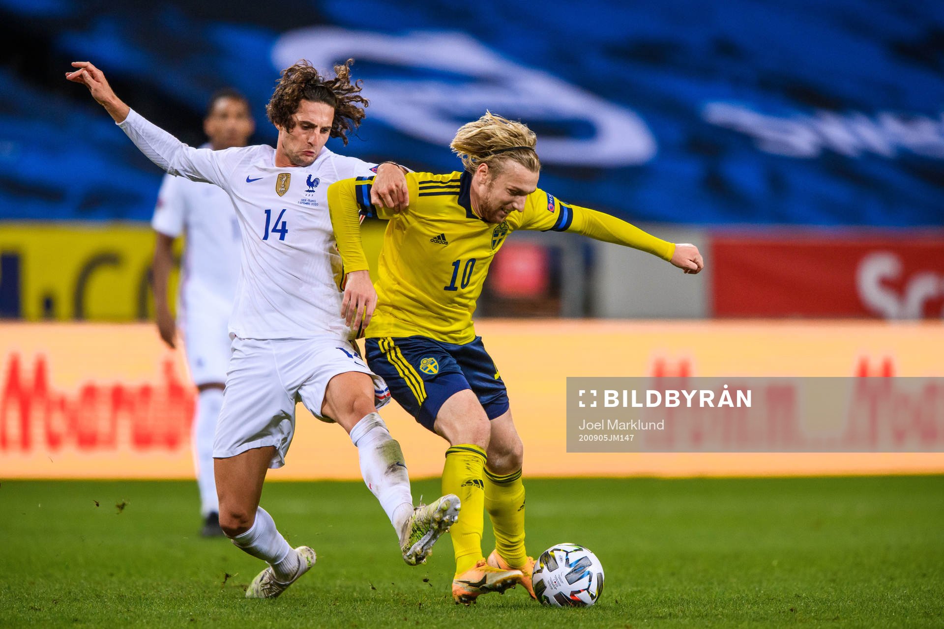 Adrien Rabiot of France and Emil Forsberg of Sweden