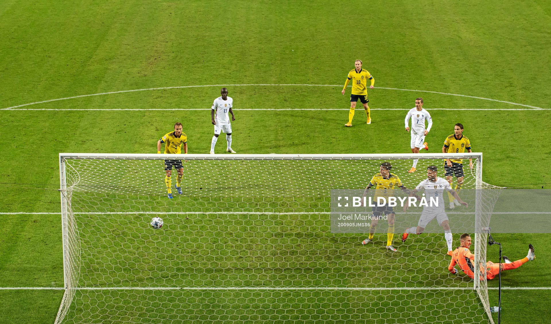 Goalkeeper Robin Olsen of Sweden lets in the 0-1 goal from