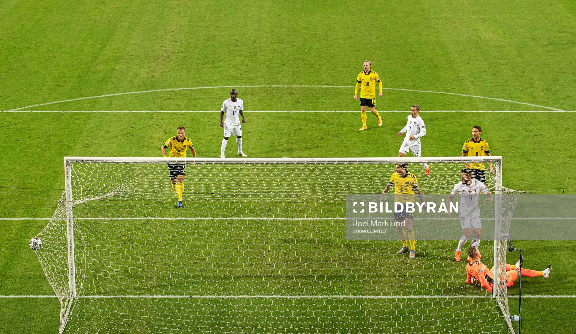 Goalkeeper Robin Olsen of Sweden lets in the 0-1 goal from