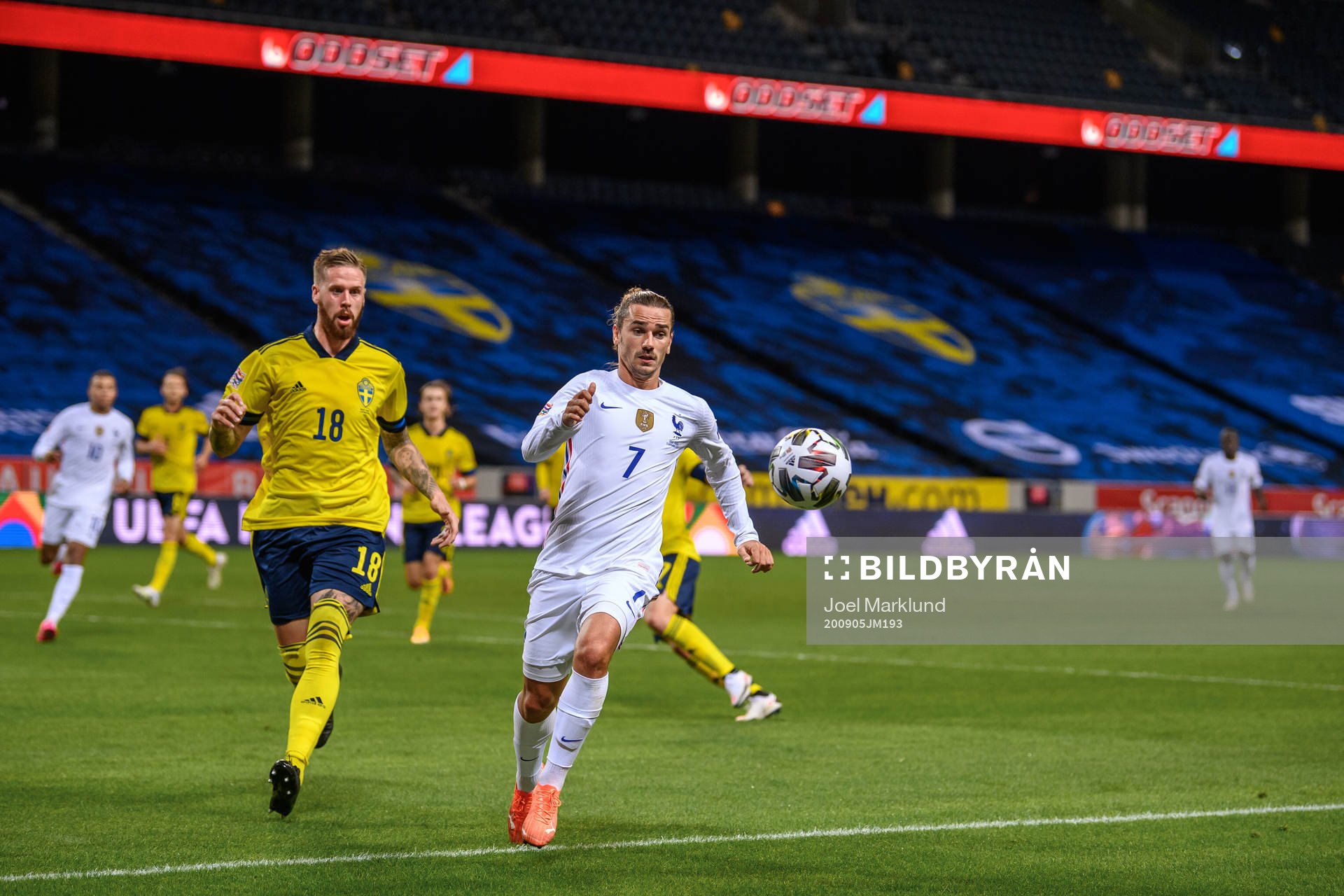 Pontus Jansson of Sweden and Antoine Griezmann of France