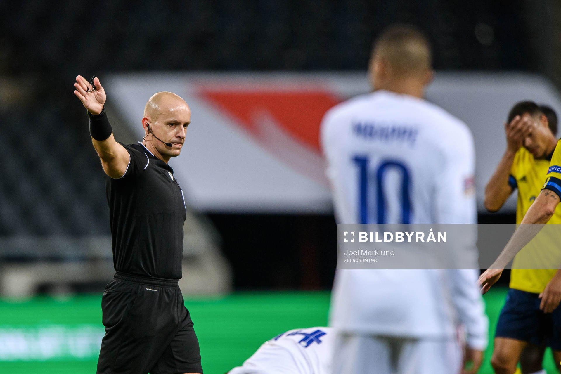 Referee Szymon Marciniak
