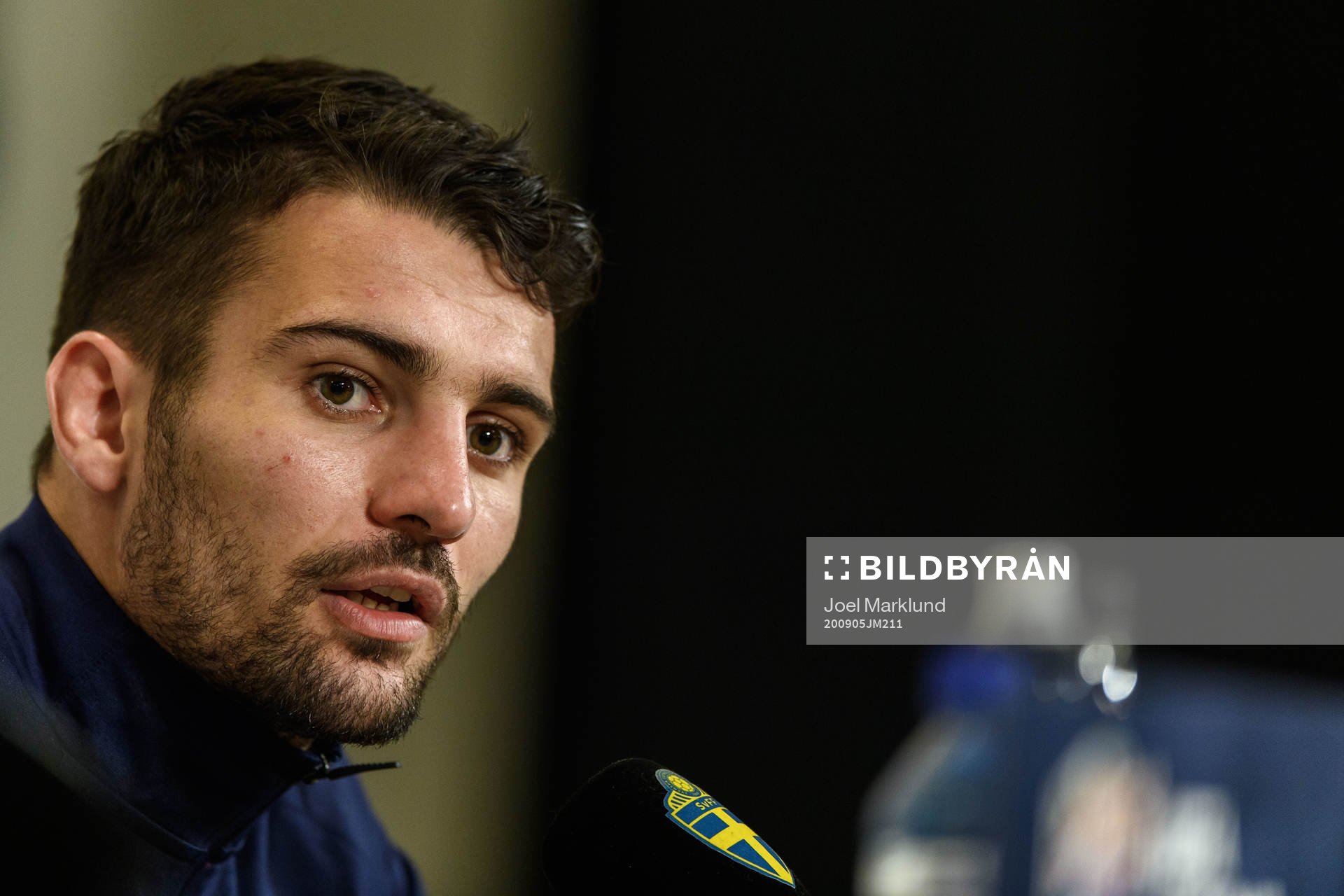 Léo Dubois of France at a press conference