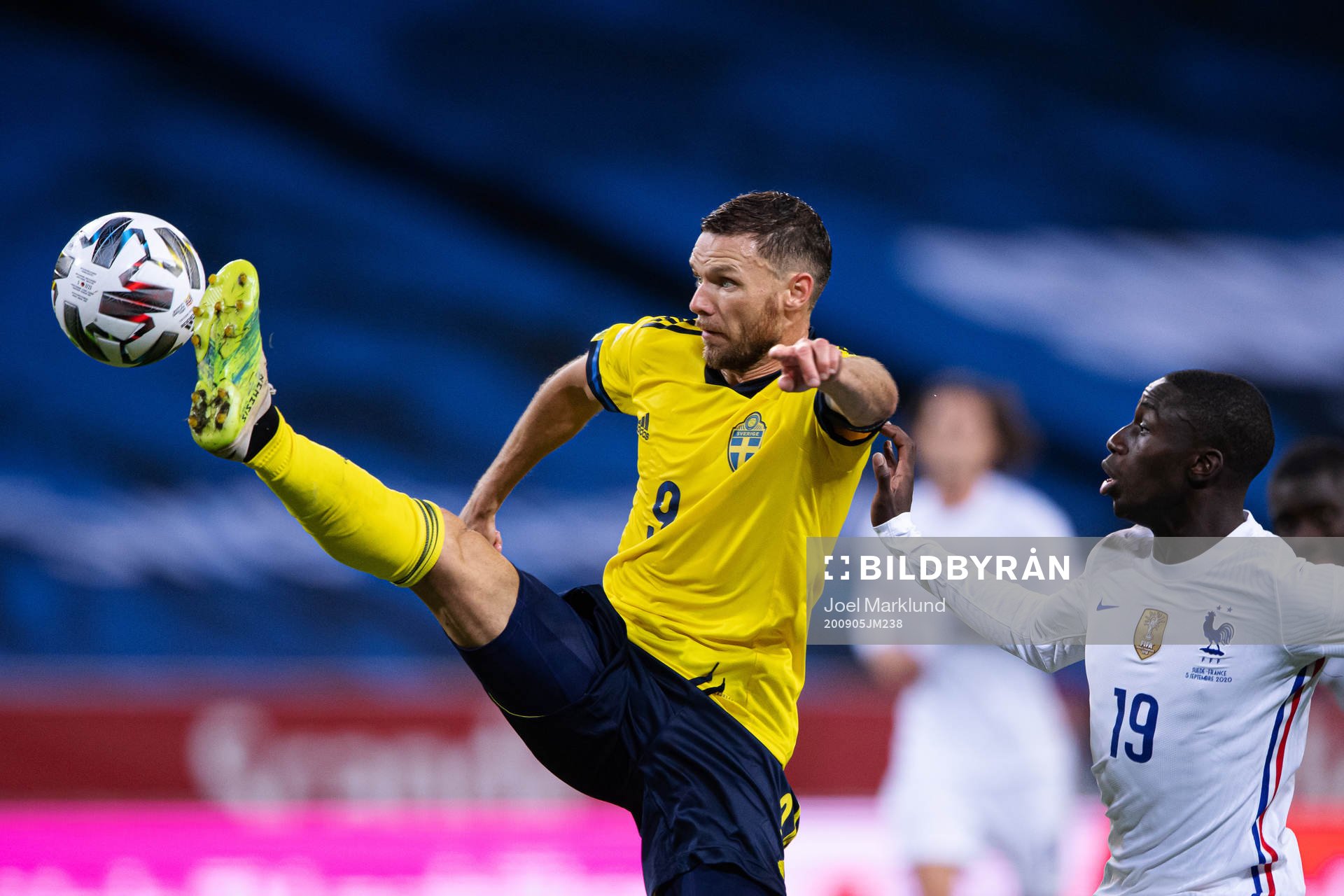 Marcus Berg of Sweden in action against Ferland Mendy of