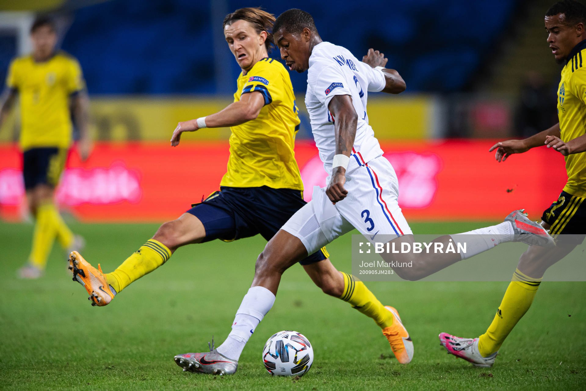 Kristoffer Olsson of Sweden and Presnel Kimpembe of France