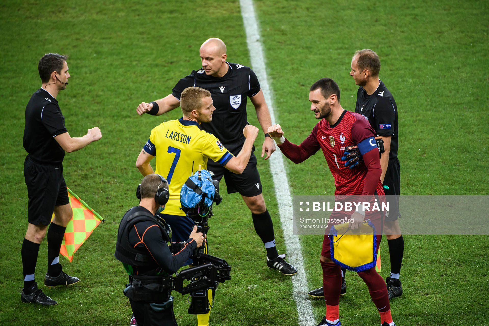 Sebastian Larsson of Sweden and goalkeeper Hugo Llorisof