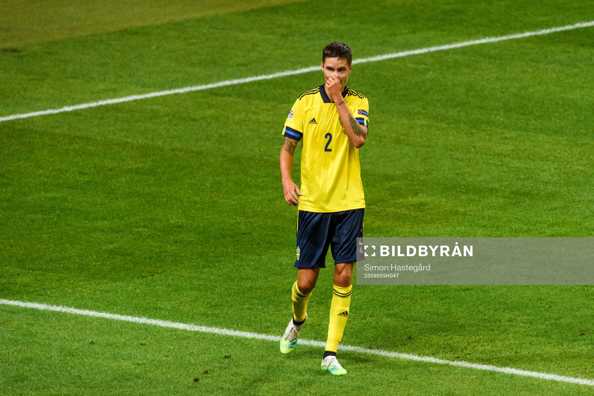 Mikael Lustig of Sweden looks dejected