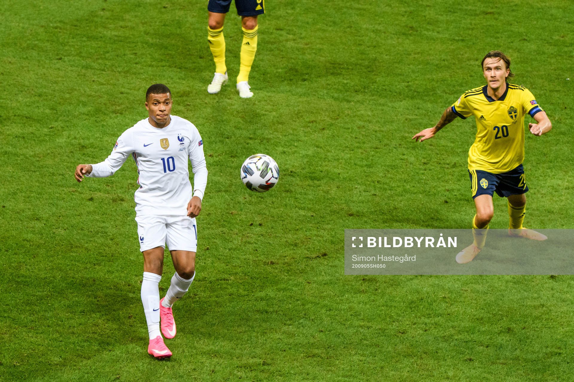 Kylian Mbappé of France and Kristoffer Olsson of Sweden