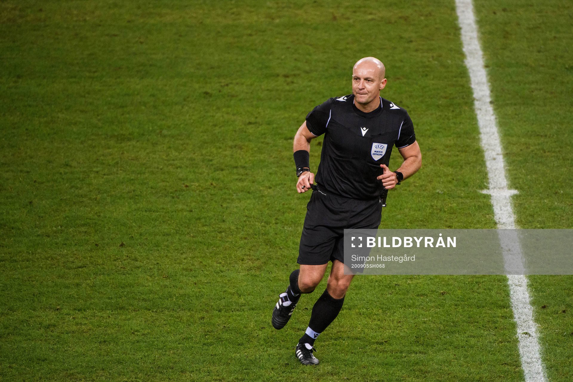 Referee Szymon Marciniak