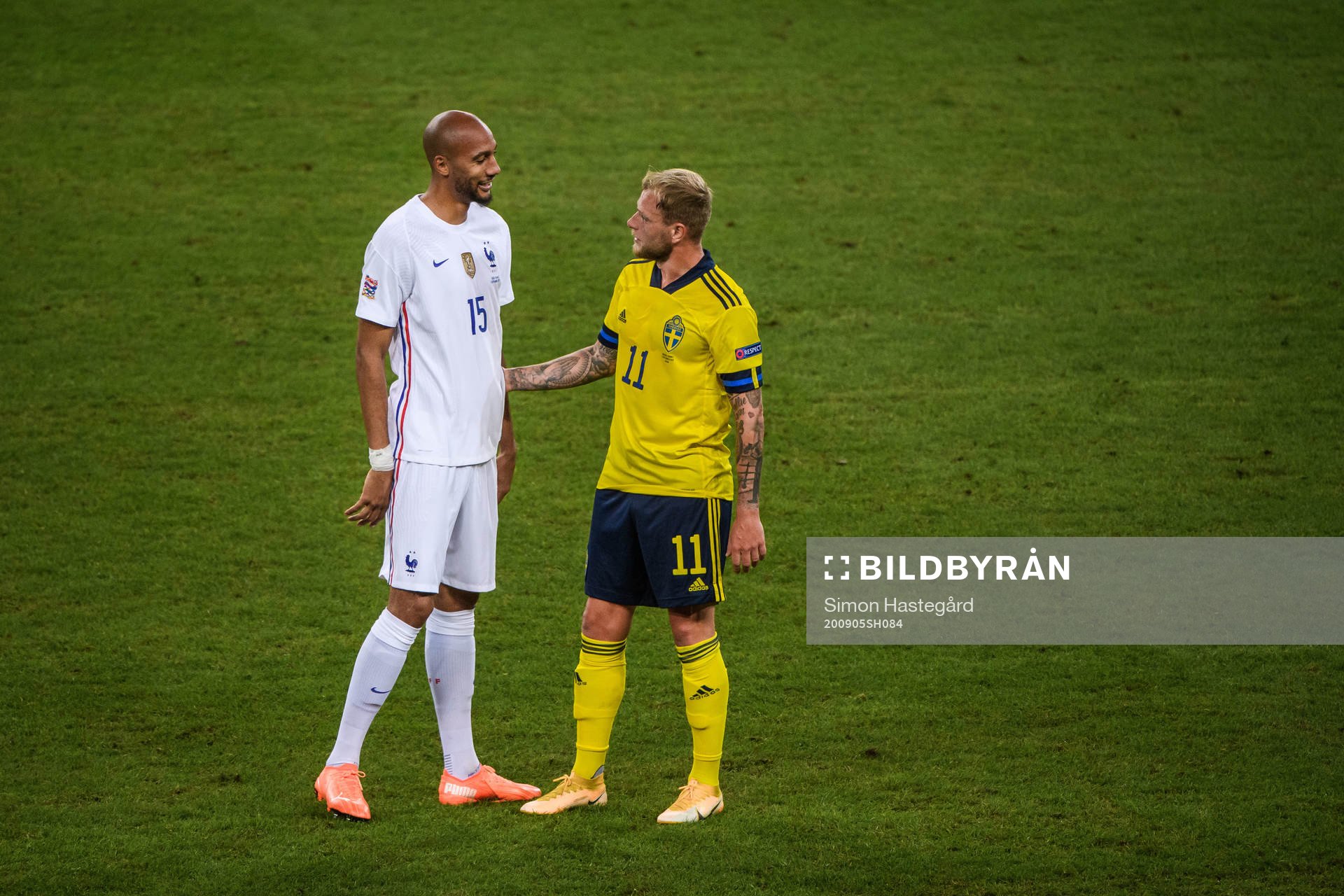 Steven Nzonzi of France and John Guidetti of Sweden
