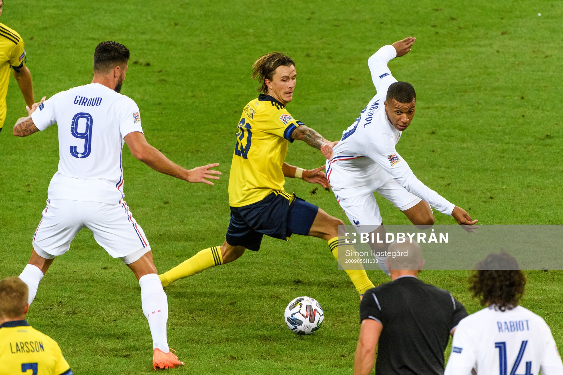 Kristoffer Olsson of Sweden and Kylian Mbappé of France