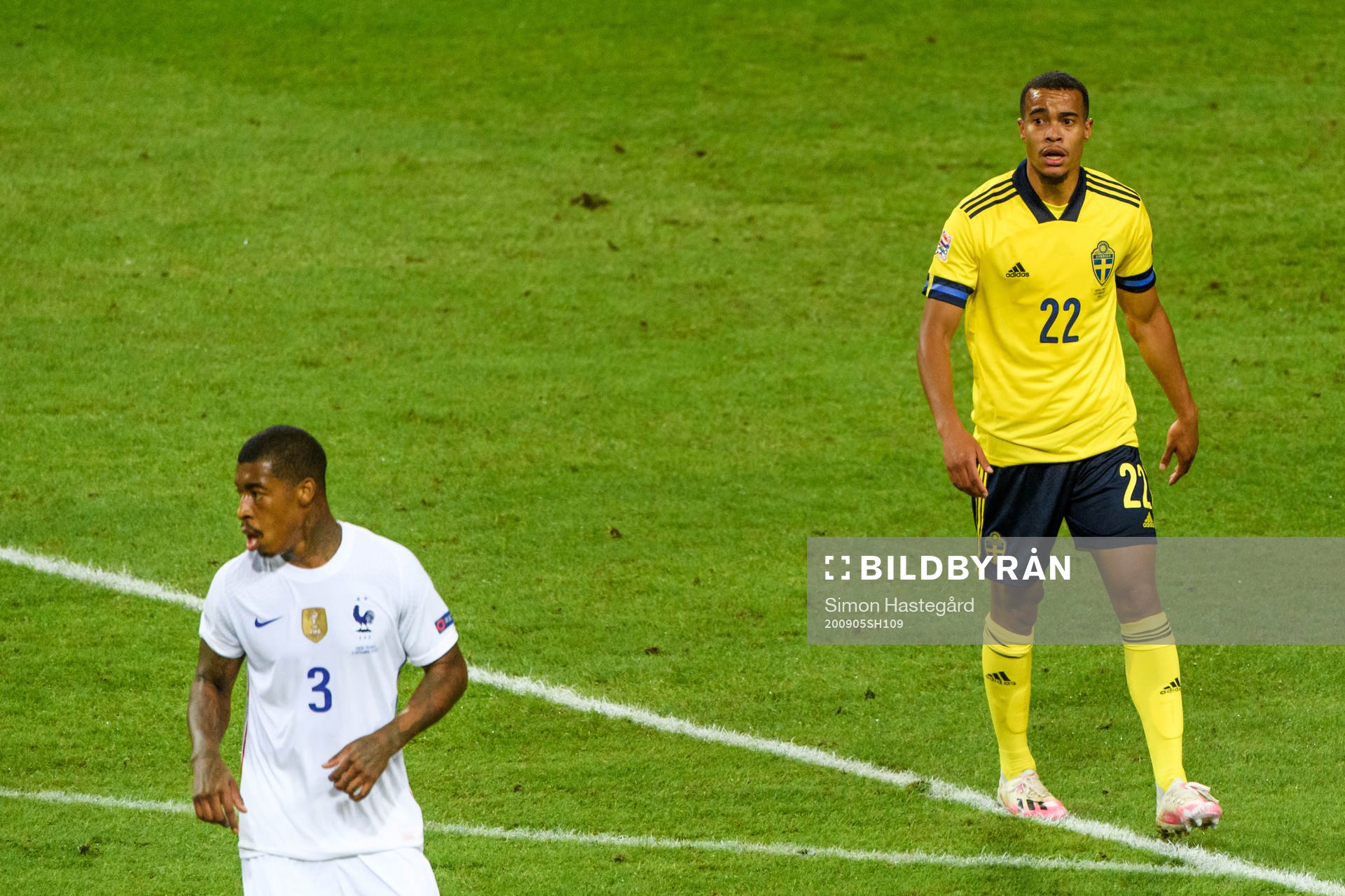 Presnel Kimpembe of France and Robin Quaison of Sweden