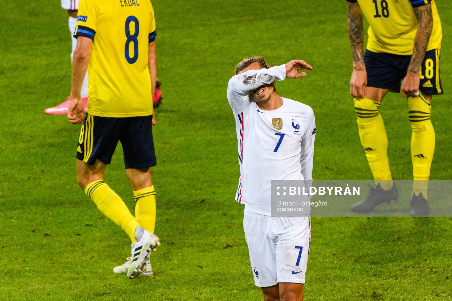 Antoine Griezmann of France looks dejected