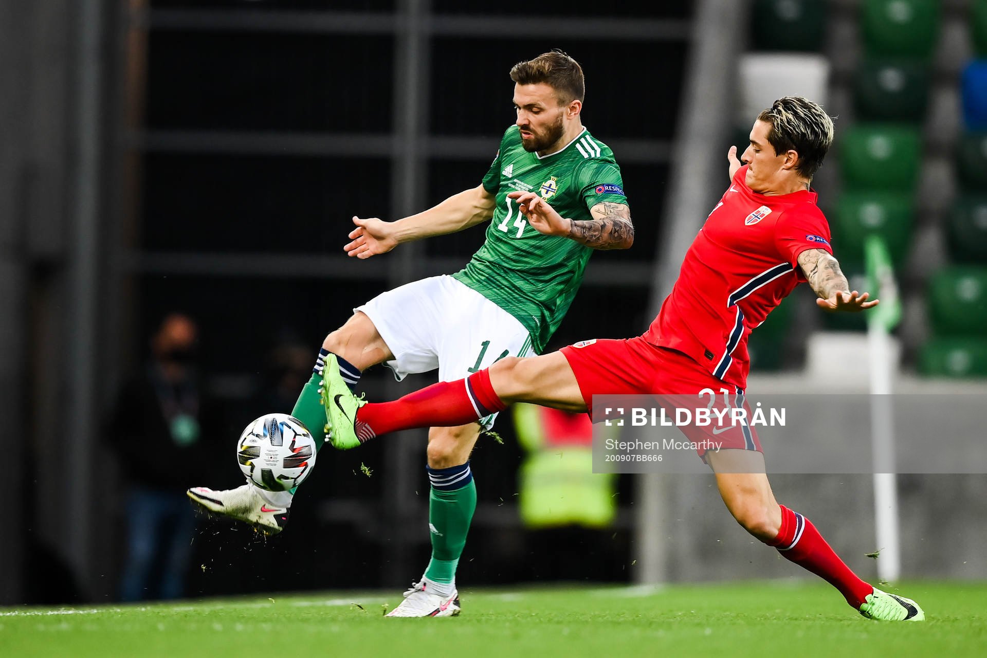 Stuart Dallas of Northern Ireland and Mathias Normann of
