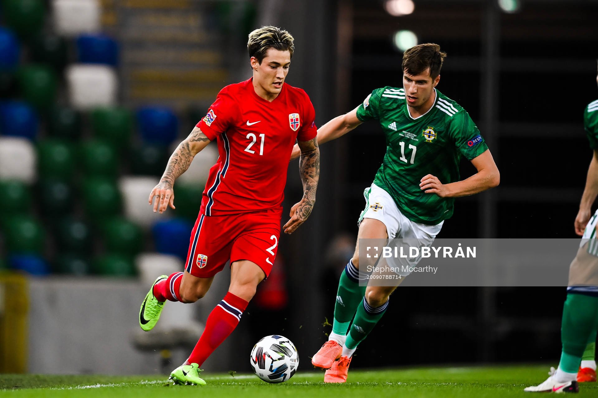 Mathias Normann of Norway and Paddy McNair of Northern