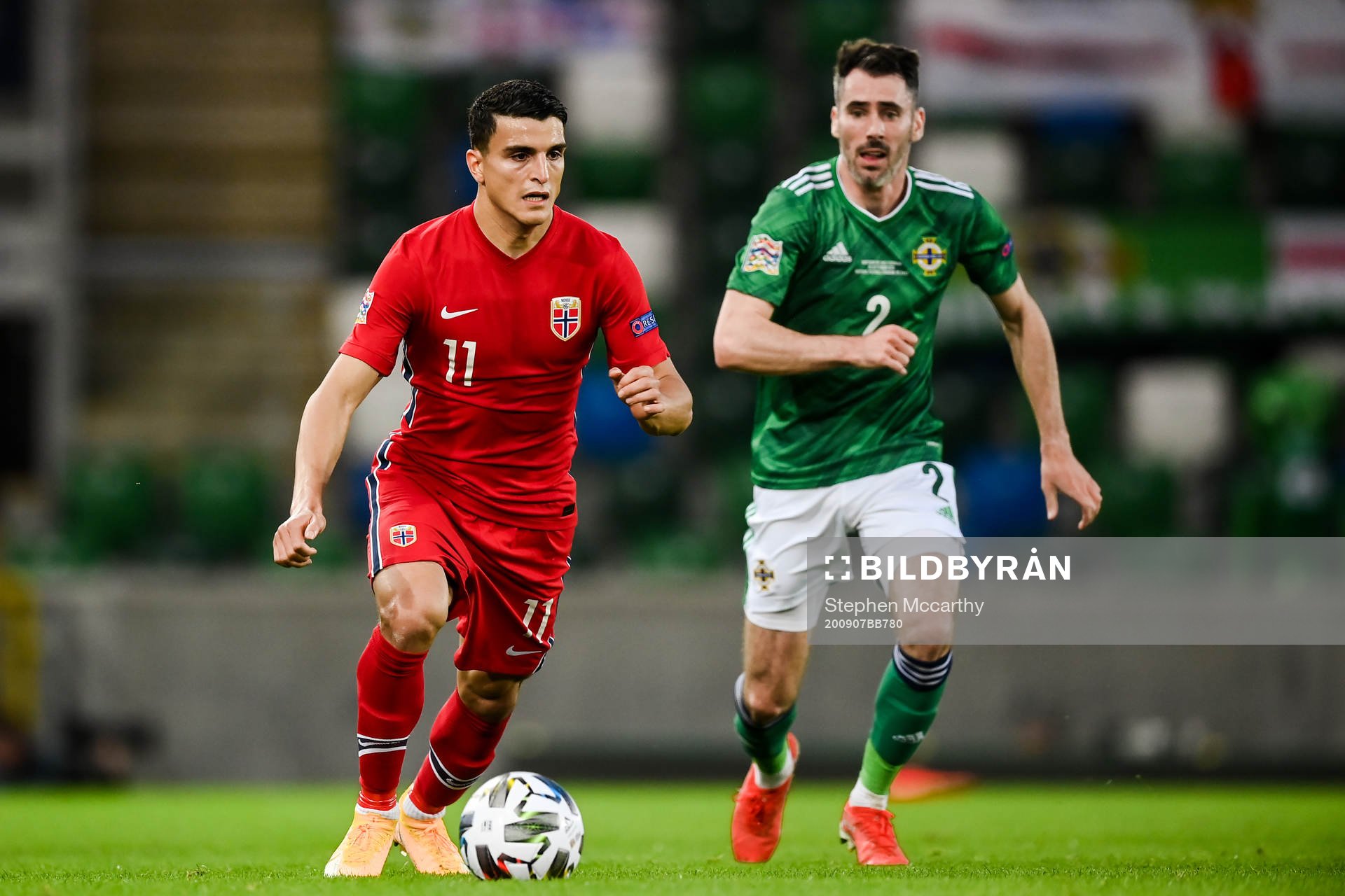 Mohamed «Moi» Elyounoussi of Norway and Michael Smith
