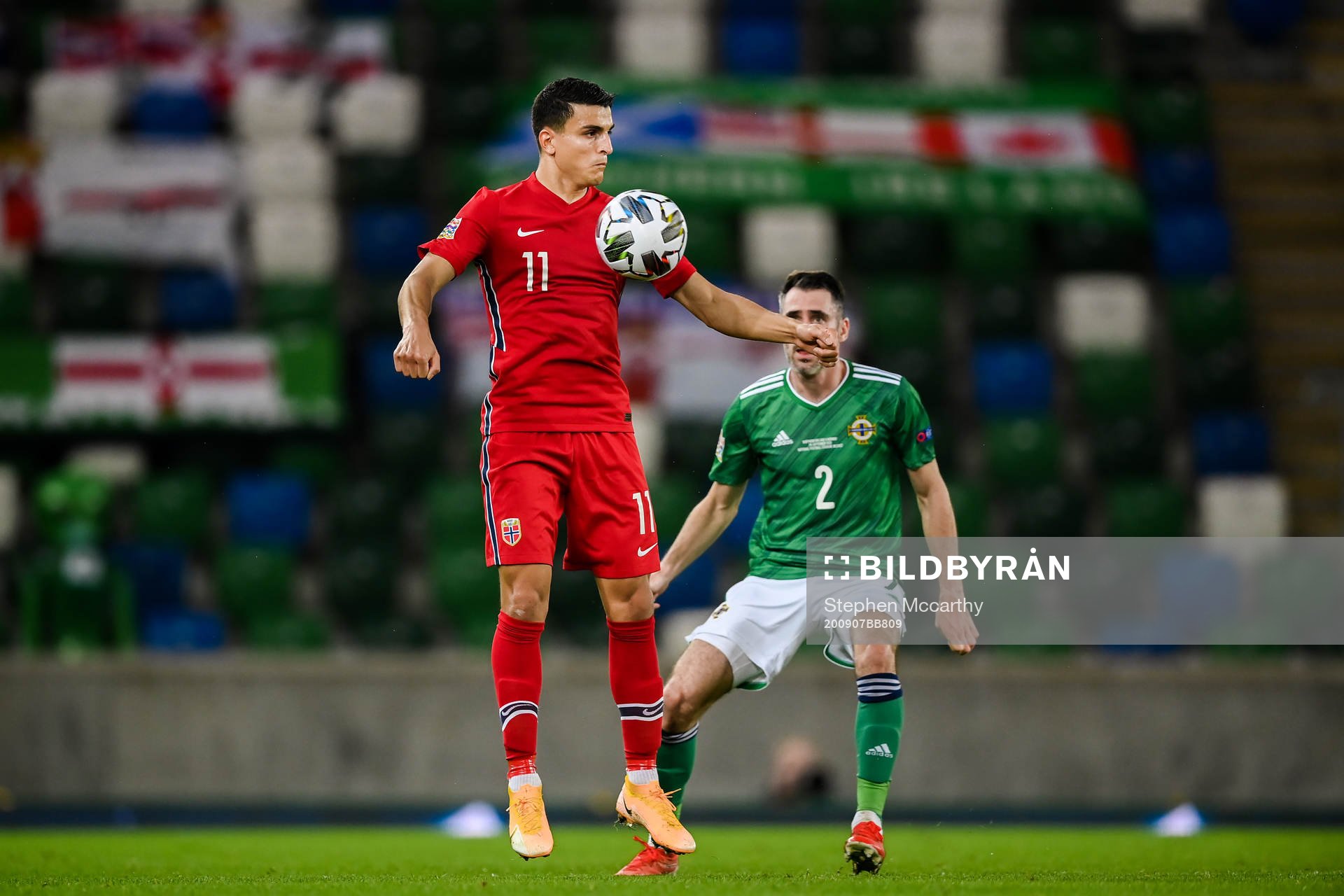 Mohamed «Moi» Elyounoussi of Norway and Michael Smith