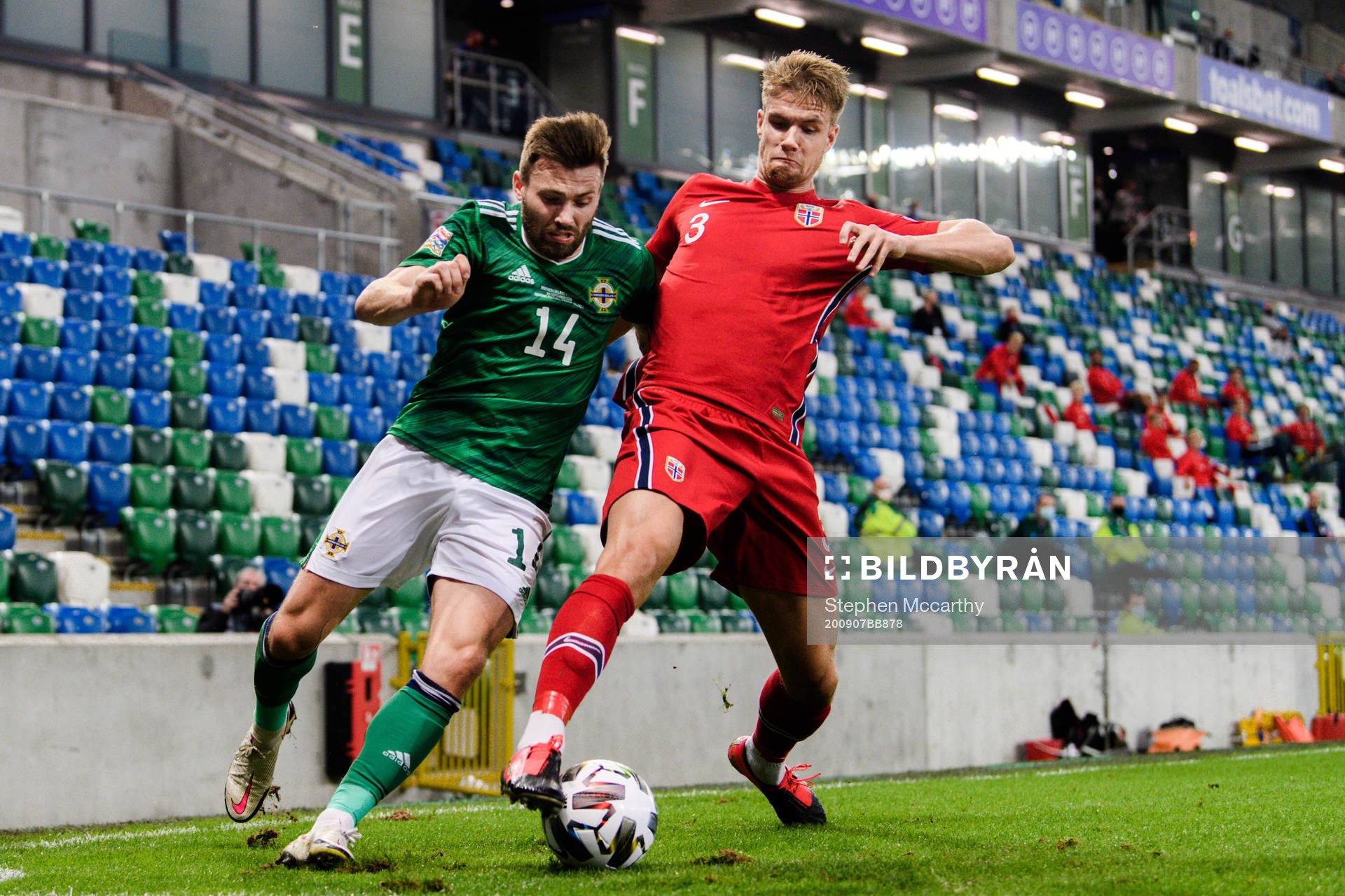 Stuart Dallas of Northern Ireland and Kristoffer Ajer of